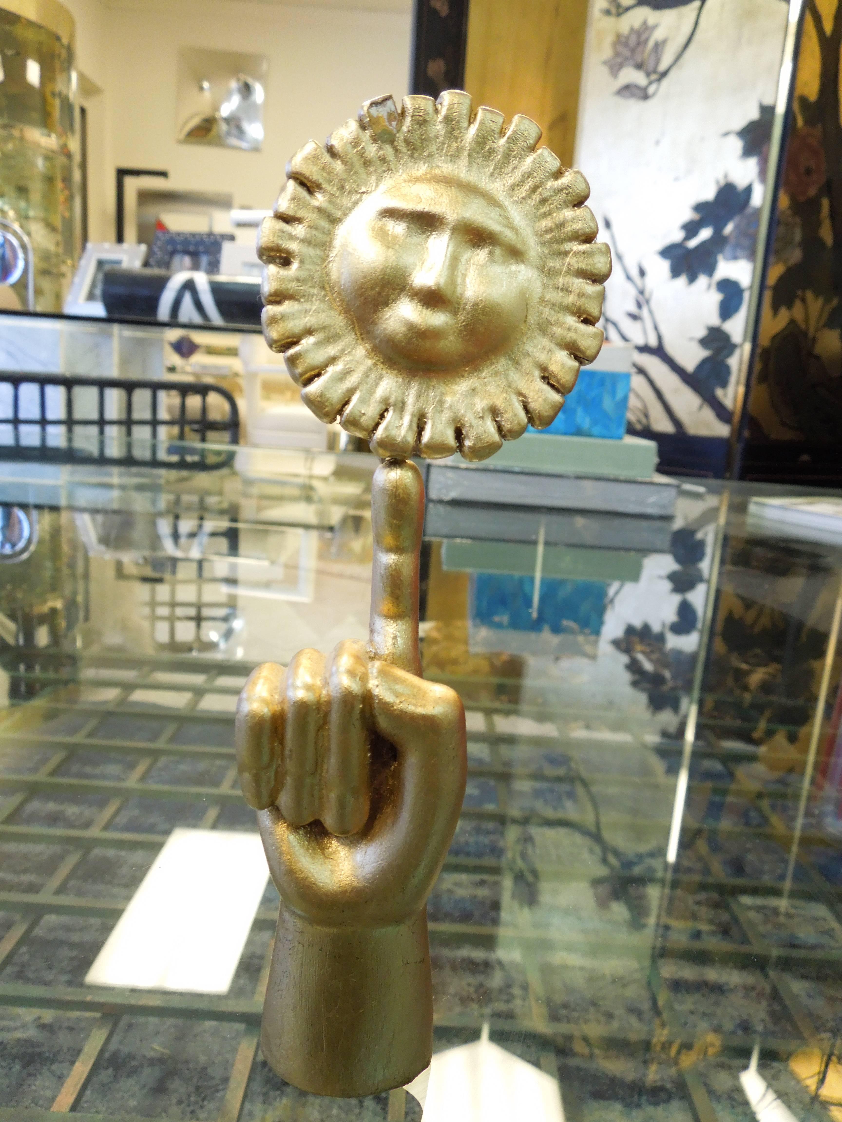 This pair of sun and moon sculptures were purchased directly from Mr. Friedeberg in the 1960s. The sun is done in original gold gilt and the moon sculpture is in mahogany. Both hand signed by the artist. From the original owner's multi-million