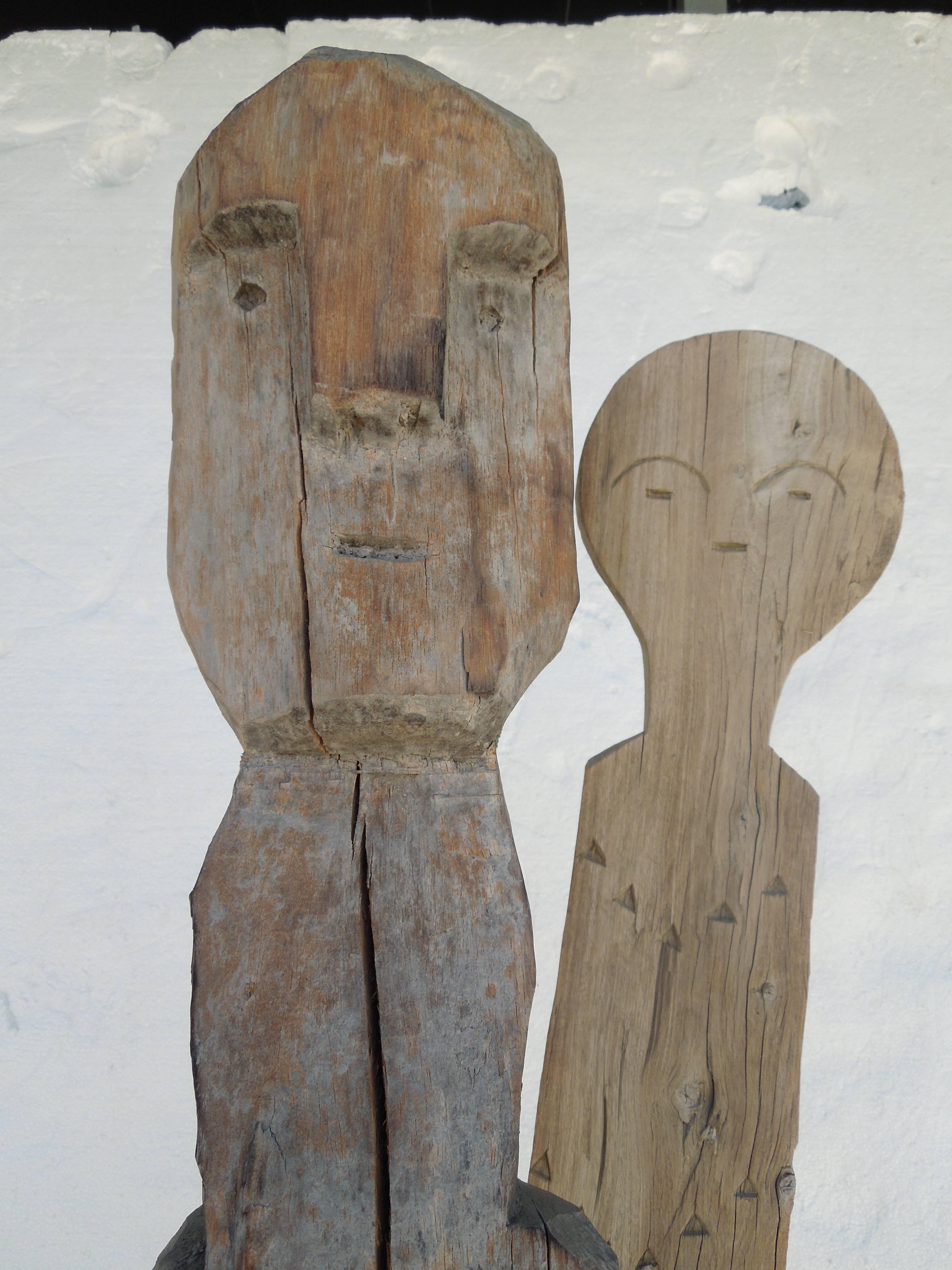 Tall Hand Carved Wood African Tribal Figures on Metal Bases In Good Condition In Palm Springs, CA