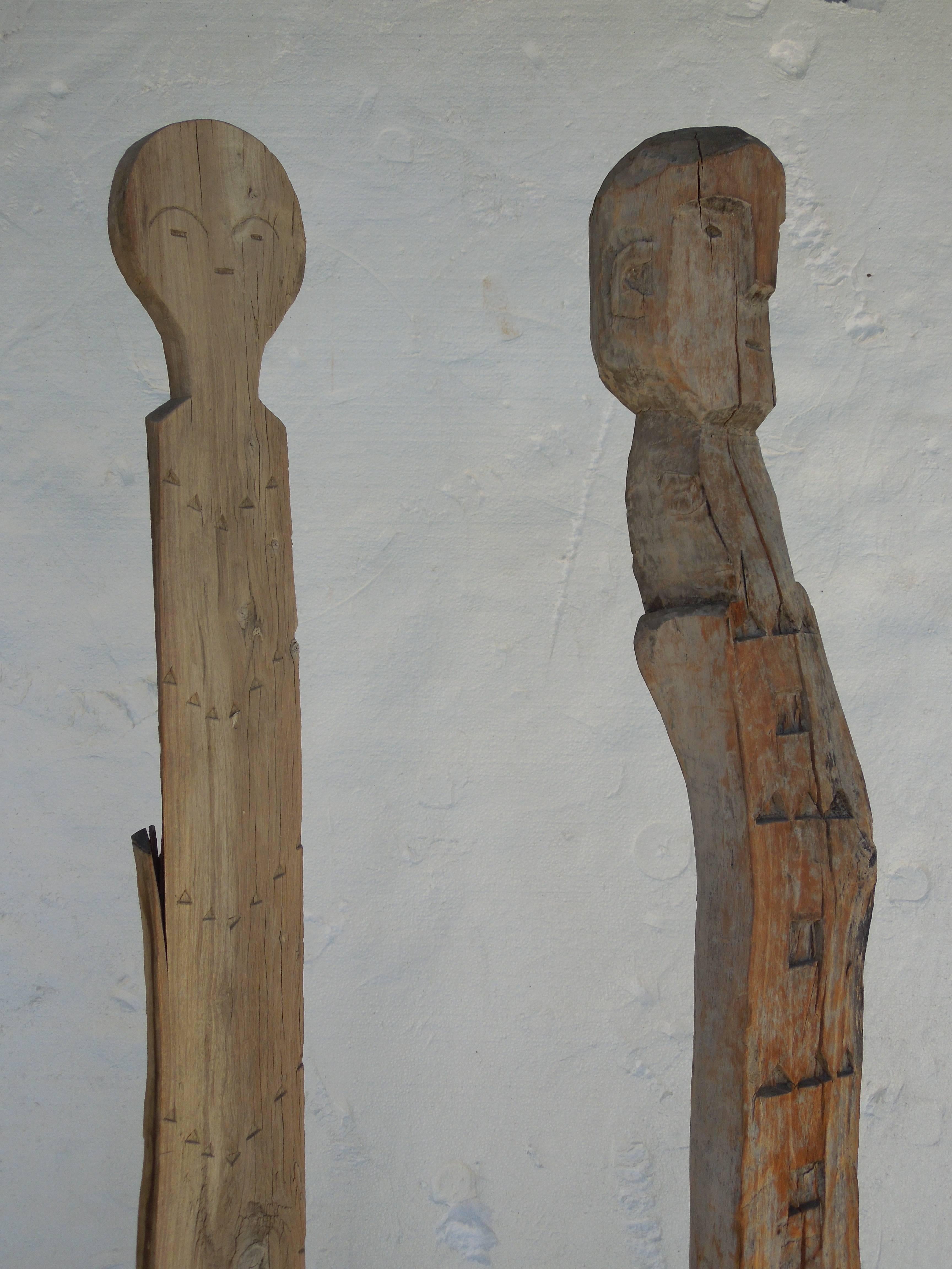 20th Century Tall Hand Carved Wood African Tribal Figures on Metal Bases