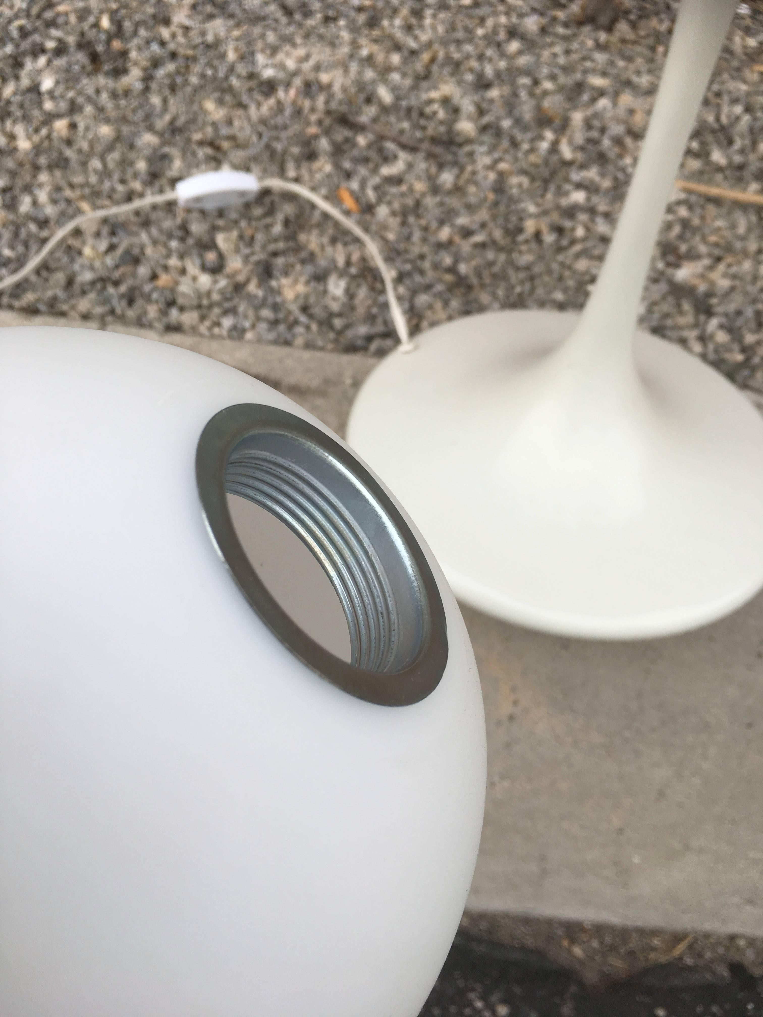 A pristine original max bill balloon lamp in matte white. Large nine globes, each handblown glass bulb screws in the nine sockets. Dimmer switch on orig cord. Handmade in Switzerland, this rare lamp is perfect example of European 1960s Modern. This