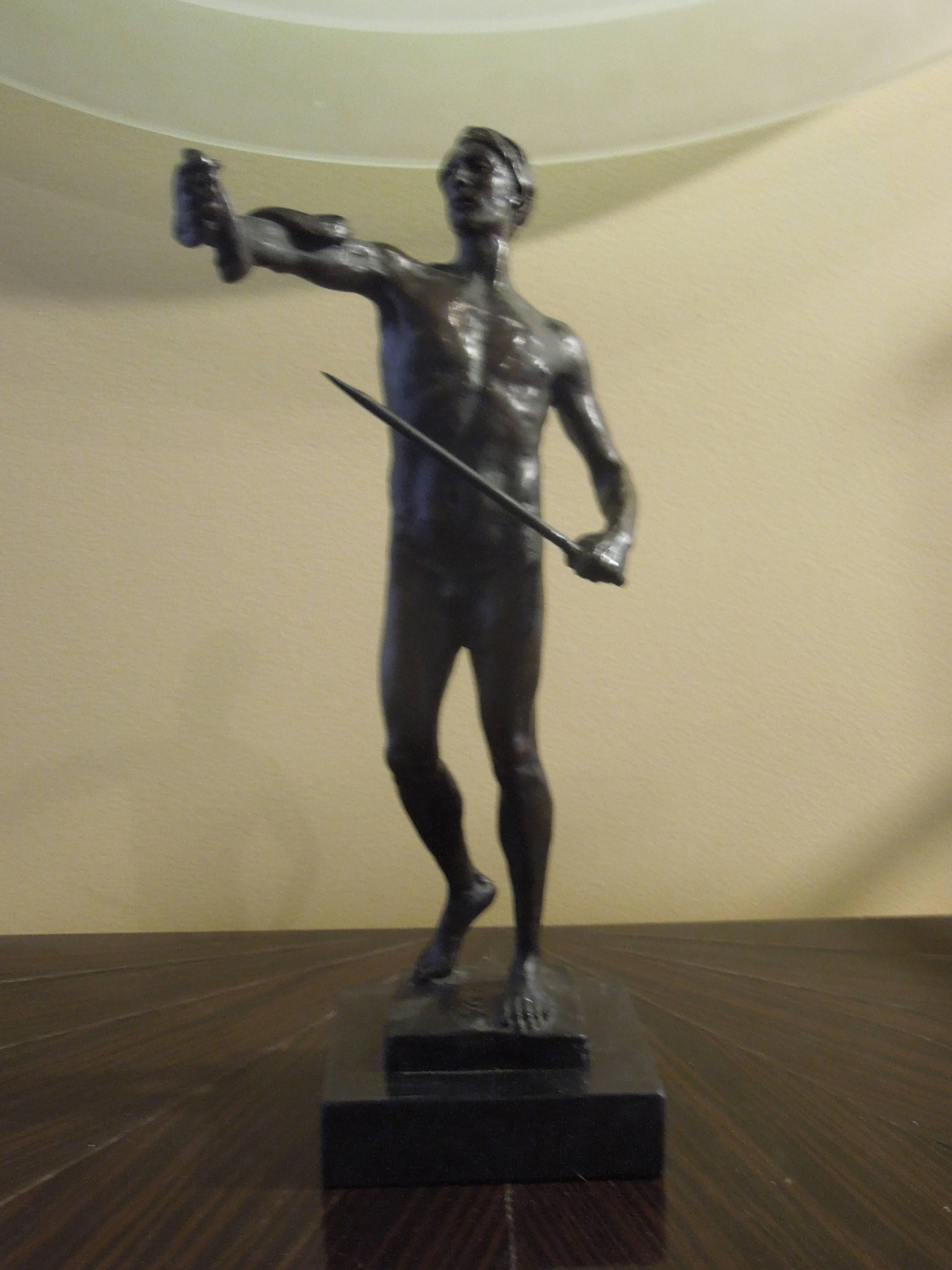 A lovely Mid-Century bronze of a male nude holding a sword with snake wrapped around his arm. This piece is unsigned. From a Palm Springs Estate that had amazing art and bronzes. Two other bronzes available on separate listing.
