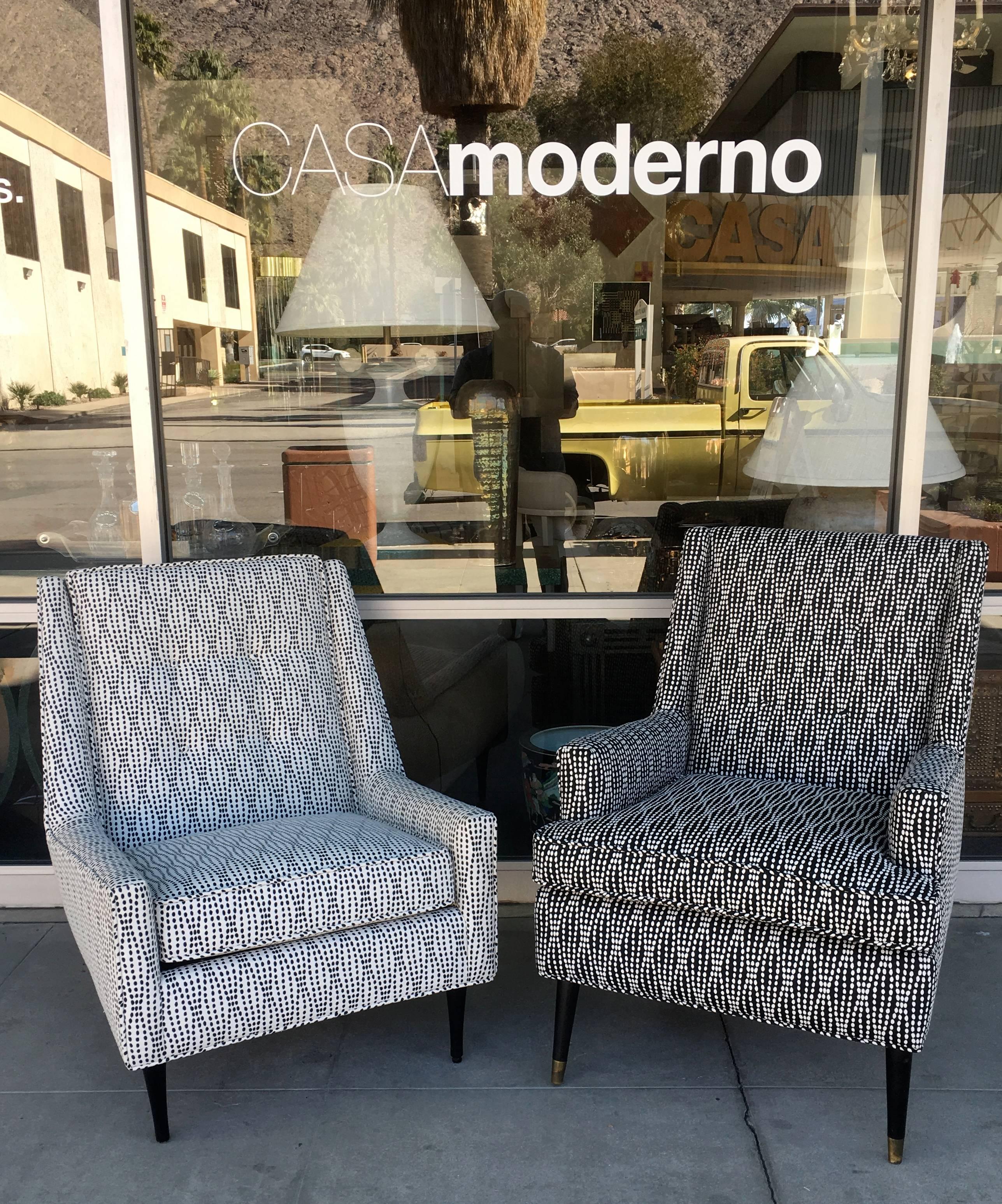 The white with black chair had a Dunbar label, the other had no label, but both chairs came from the same vintage Palm Springs Estate. The woman's black with white chair is taller and a little more narrow. They look amazing together in a positive or