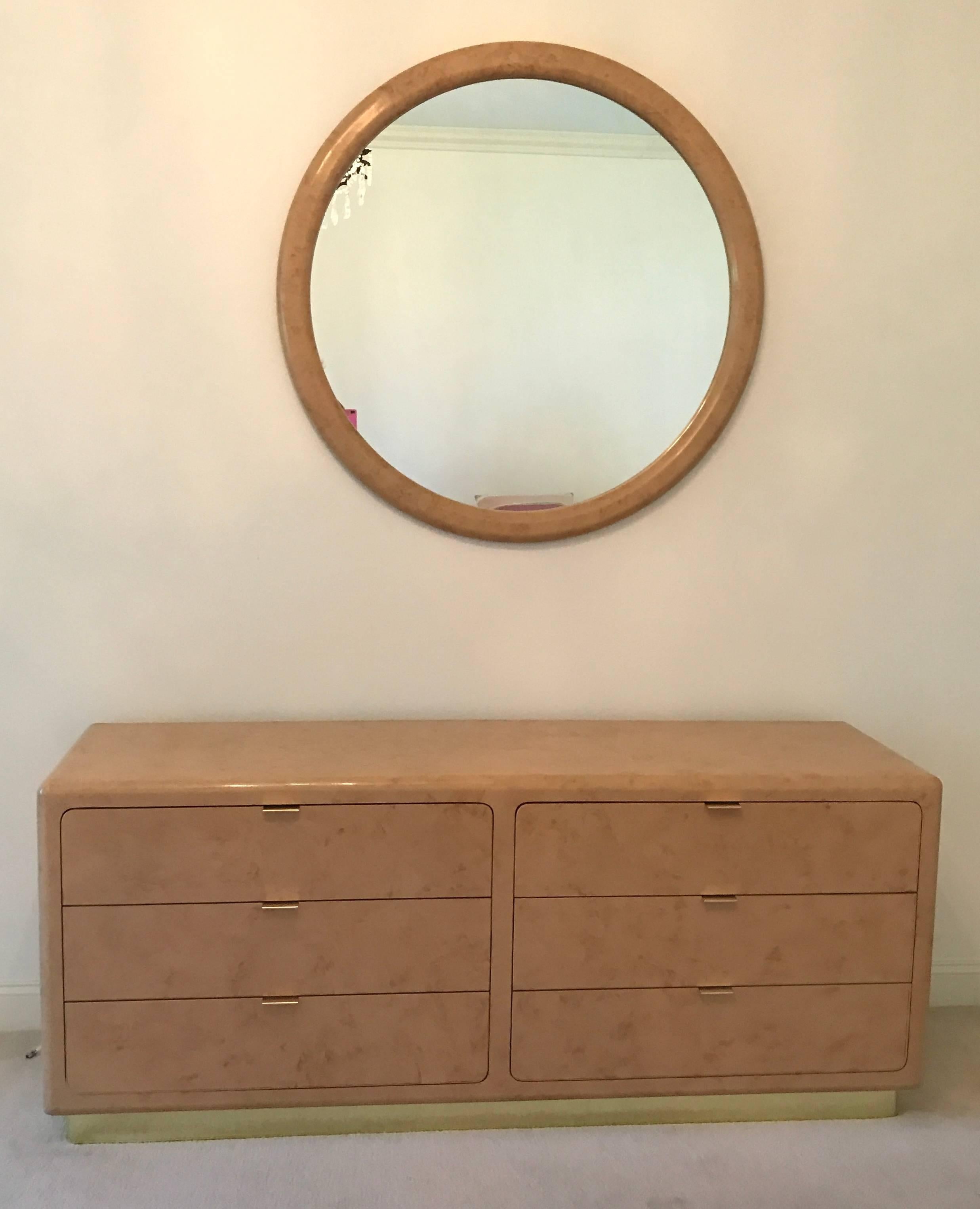 This is the matching mirror to the beautiful custom dresser on separate listing. The entire master bedroom suite was custom-made for a very high end Palm Springs area Country Club residence. Clean, modern wood frame in custom faux goatskin finish.