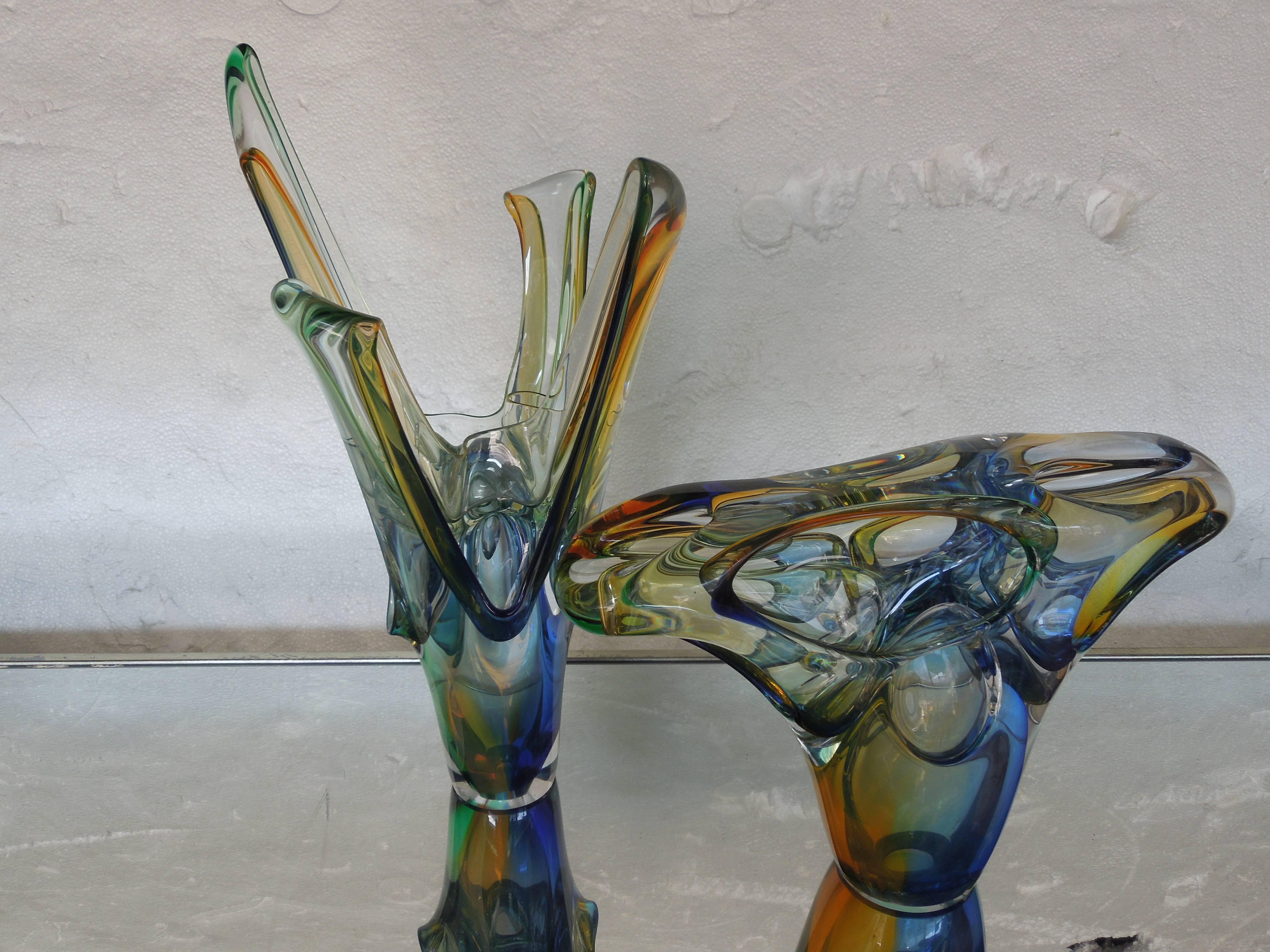A spectacular piece of glass art. Sculpture by A. Jablanski. The multi-color (blue, amber, green) piece is amazing from all sides. This piece came from a multi million dollar Rancho Mirage, CA estate. Signed. Sister piece available on separate