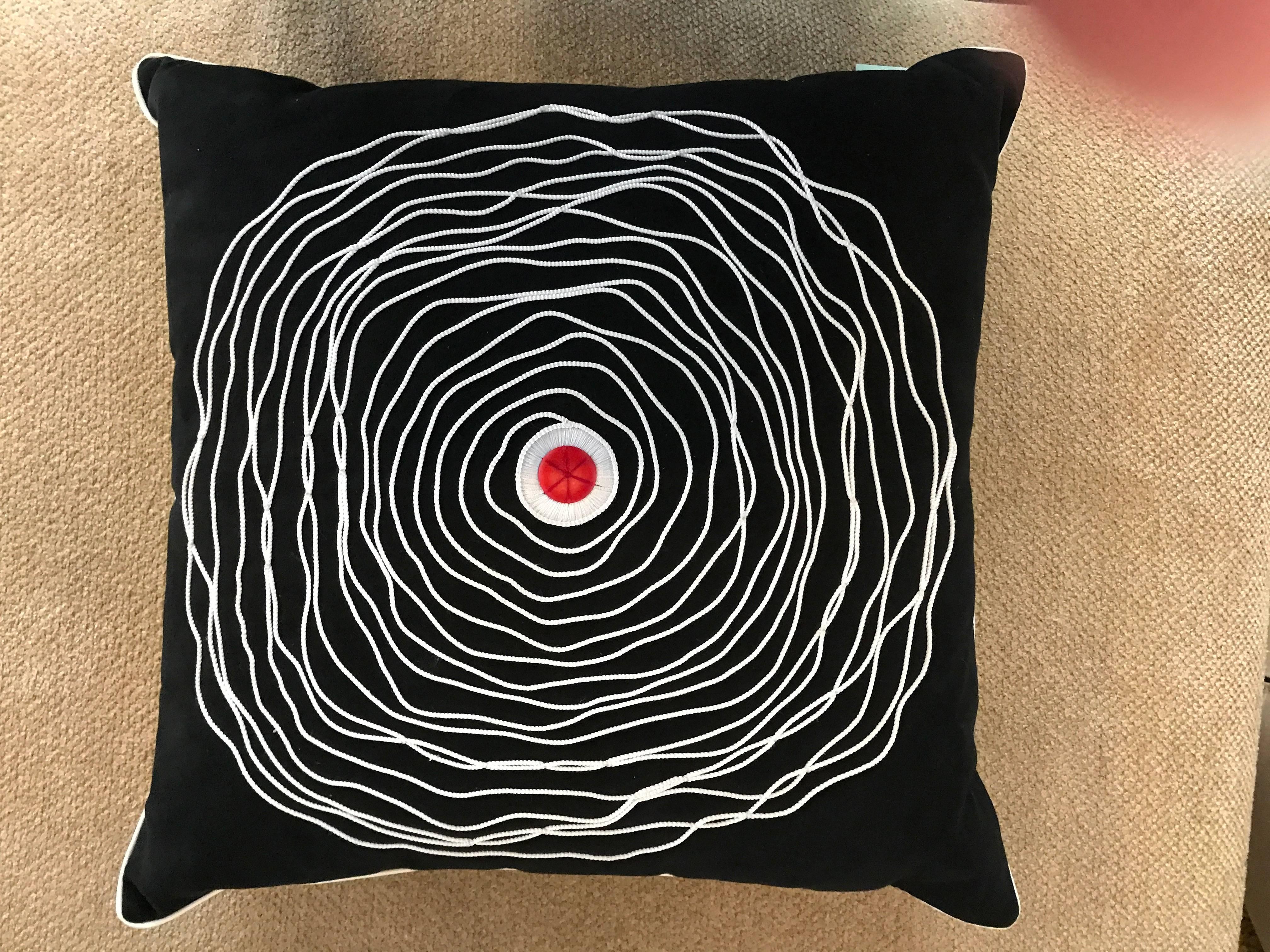 These very high end decorative pillow came from the premiere home store in Palm Springs, CA that closed over a decade ago. They were purchased by my interior designer client and never used. Still obtains original tag. Amazing Bindu spiral cording