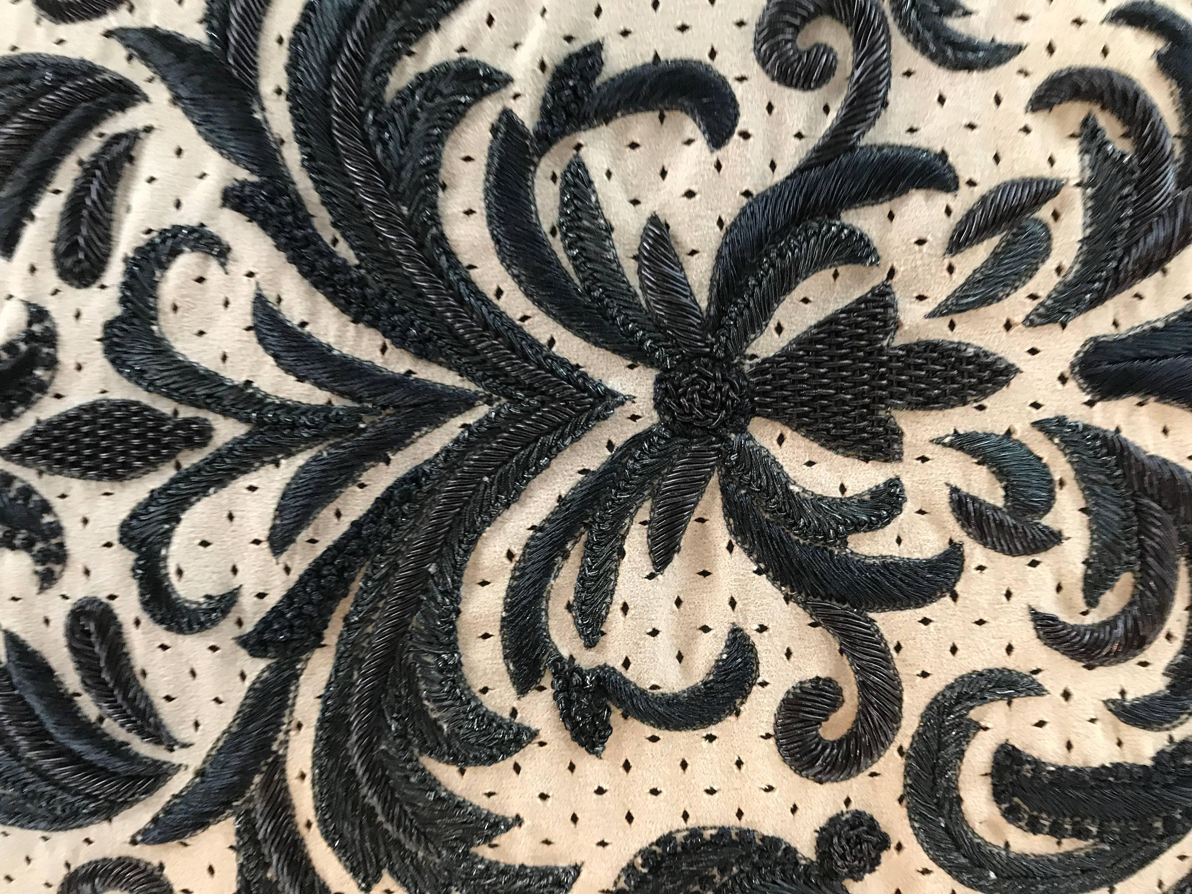 This very high end square pillow came from the premiere home store in Palm Springs, CA over a decade ago. Purchased by my clients, they were never used. Made entirely of high end perforated ultra suede, the ornate design is embroidered in a thick,