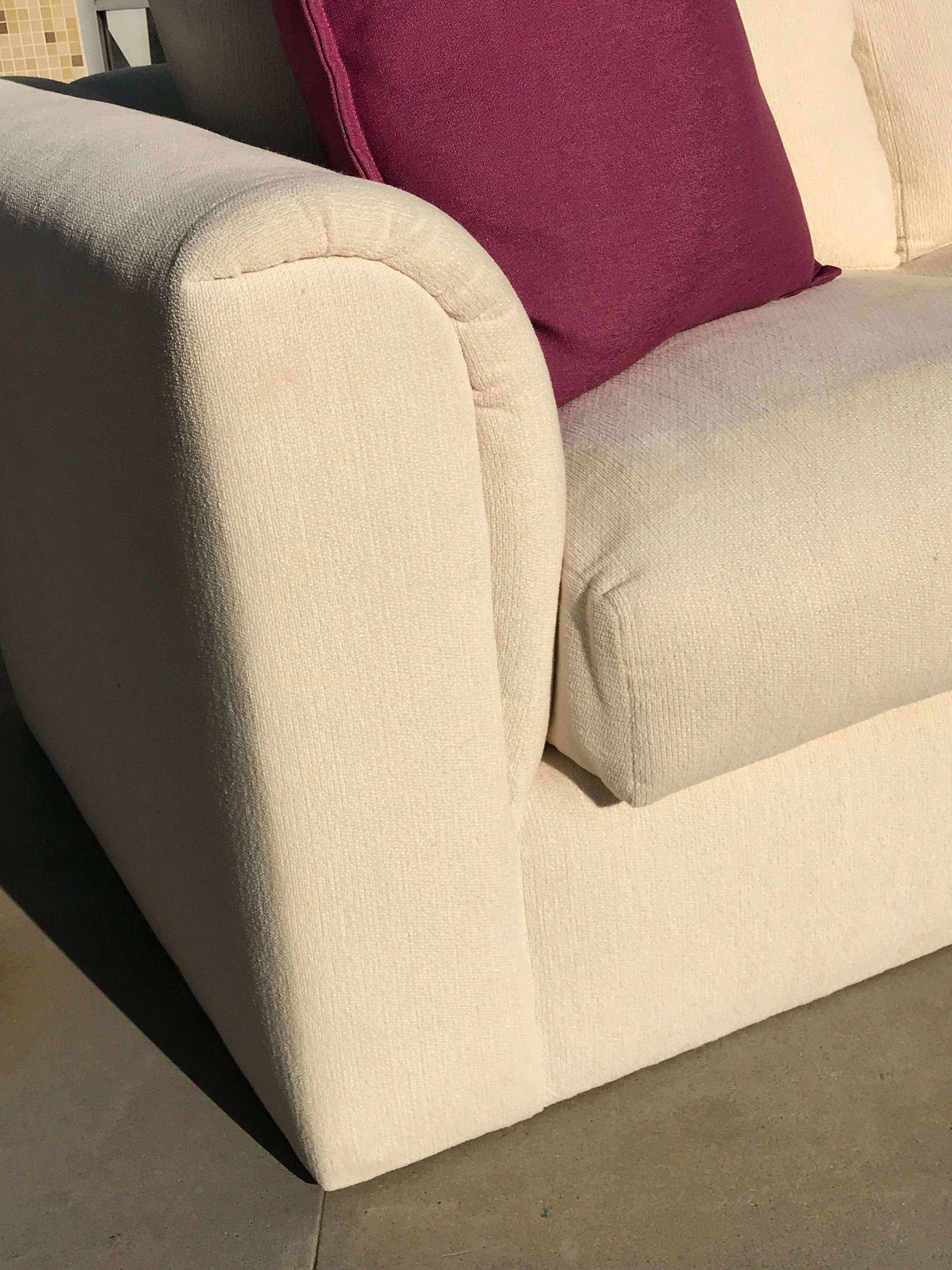 This sofa designed by Sally Sirkin Lewis for J. Robert Scott came from an upscale Rancho Mirage Country Club Estate. It was seldom used as is as comfortable as it is good looking. Matching club chair available on separate listing. The back cushions