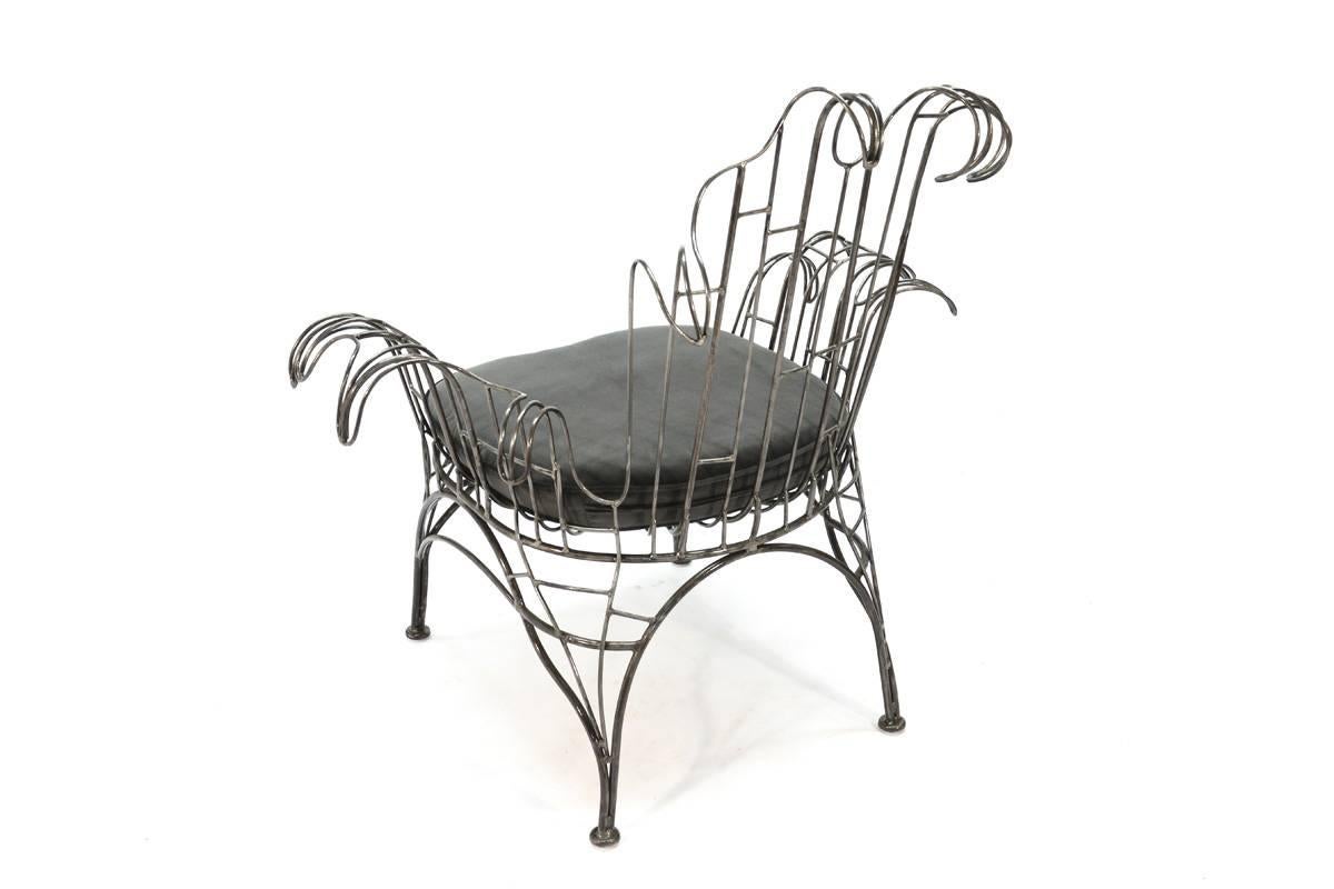 Fantastic sculptural organic Baroque lounge chair designed by Tony Duquette. Tony Duquette first conceived the organic Baroque chair while serving in the Army during World War II -- but the design wasn't realized until the 1960s. This example