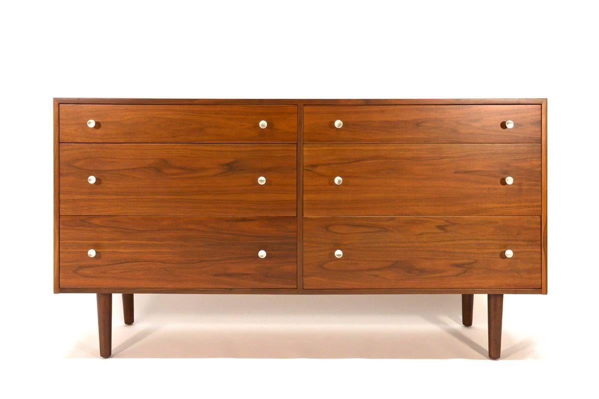 Beautiful dresser designed by Milo Baughman for Glenn of California. The walnut used on this piece is just stunning. This piece has been completely restored and is immaculate condition.
Measures:
64.5