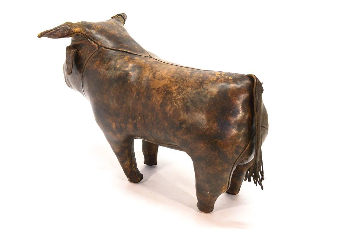 A very fun piece designed by Dimitri Omersa for Abercrombie and Fitch in the 1960s. Part of a line of leather animals that were meant to be used as ottomans and stools. This example shows very nicely with some minor damage to the one horn as