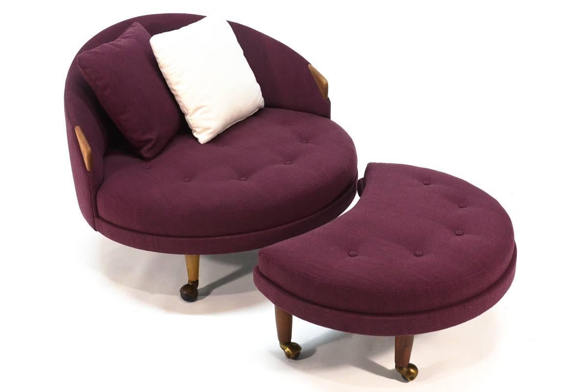 Very fun piece designed by Adrian Pearsall for Craft Associates, and known as the Havana chair or the round chair. It is fairly uncommon to see these with the original crescent ottoman. This piece has been completely restored with a vintage purple