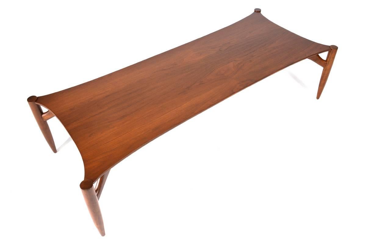Rare coffee table designed by Greta Grossman for Glenn of California, 1959.

Measures: 61.5" long x 25.5" deep x 15.25" tall.
 