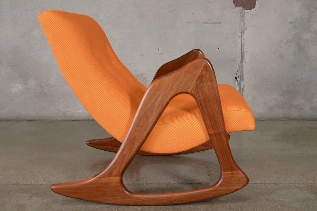 Stunning sculptural rocking chair designed by Adrian Pearsall for Craft Associates, model 812-CR. The crescent shaped seat floats between the two highly sculptural walnut arms. A true statement rocking chair. This piece has been fully restored and