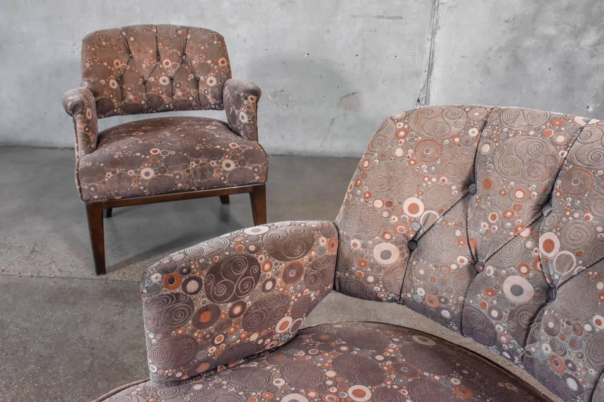 Very fun pair of tufted back petite lounge chairs, designed by Maurice Bailey for Monteverdi Young and upholstered in a unique Jack Lenor Larsen style fabric. These chairs are in original condition so the fabric shows varying amounts of fading