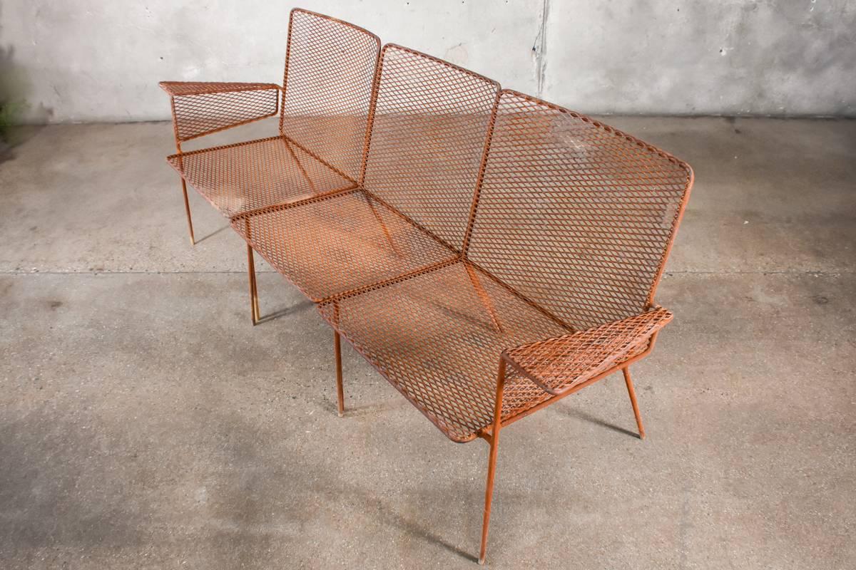 A three-piece expanded metal patio sofa by Van Keppel-Green. The two single armchairs and centre chair can be used in various configurations to meet your needs. This all original set has very nice patina, but there is no loss or damage to the pieces