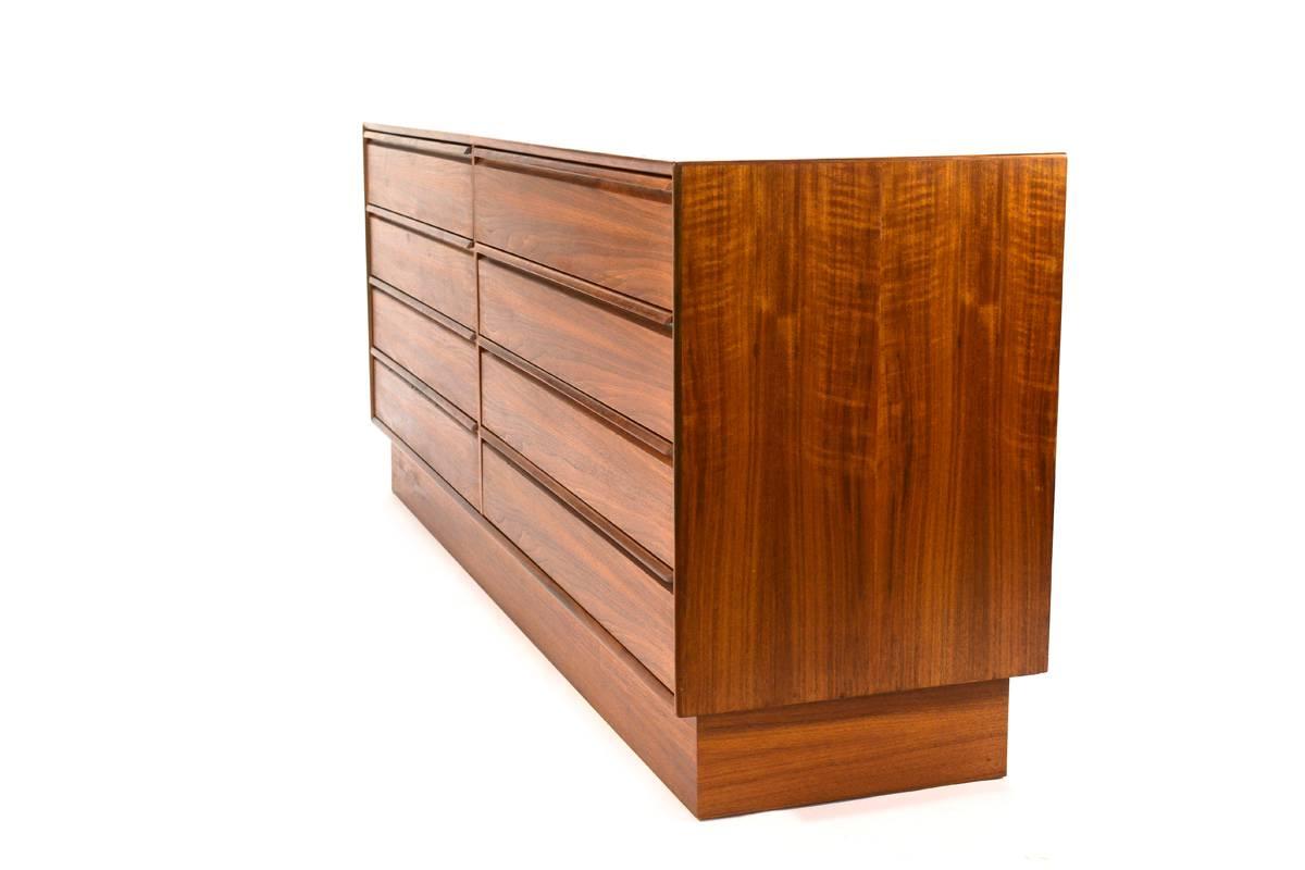 Very nice eight drawer teak dresser produced by Westnofa in Norway in the 1970's. A very high quality piece with great attention to detail. Notice the book matched teak grain on the drawer fronts. This piece is all original and in very good