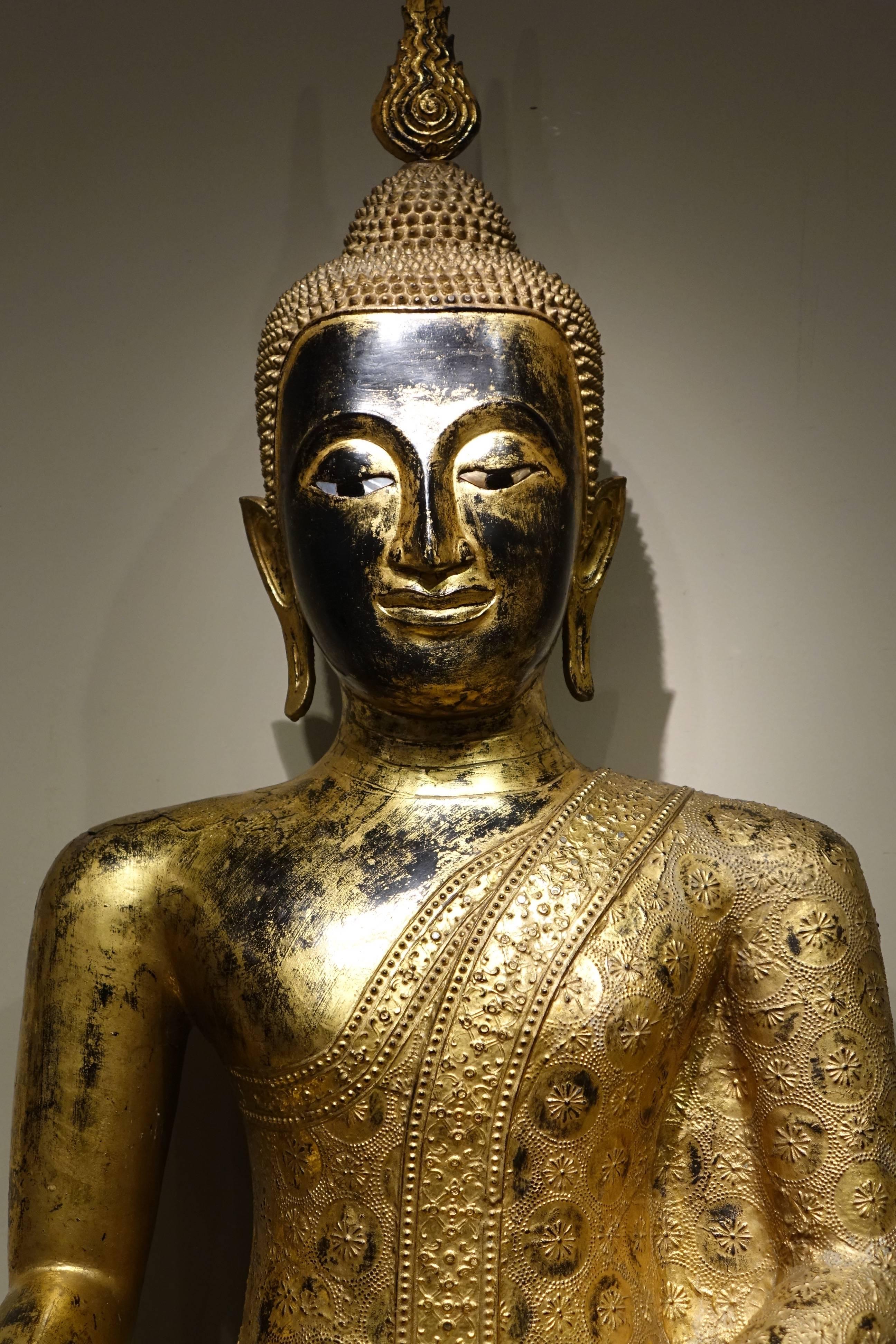 Bronze Buddha statue in Rattanakosin Style.
 Late 19th century Rama V's reign (1868–1910)
Buddha in lacquered and gilt bronze in the sitting position of Bhumisparsa, or gesture of the taking of the earth to witness (undoubtedly one of the most