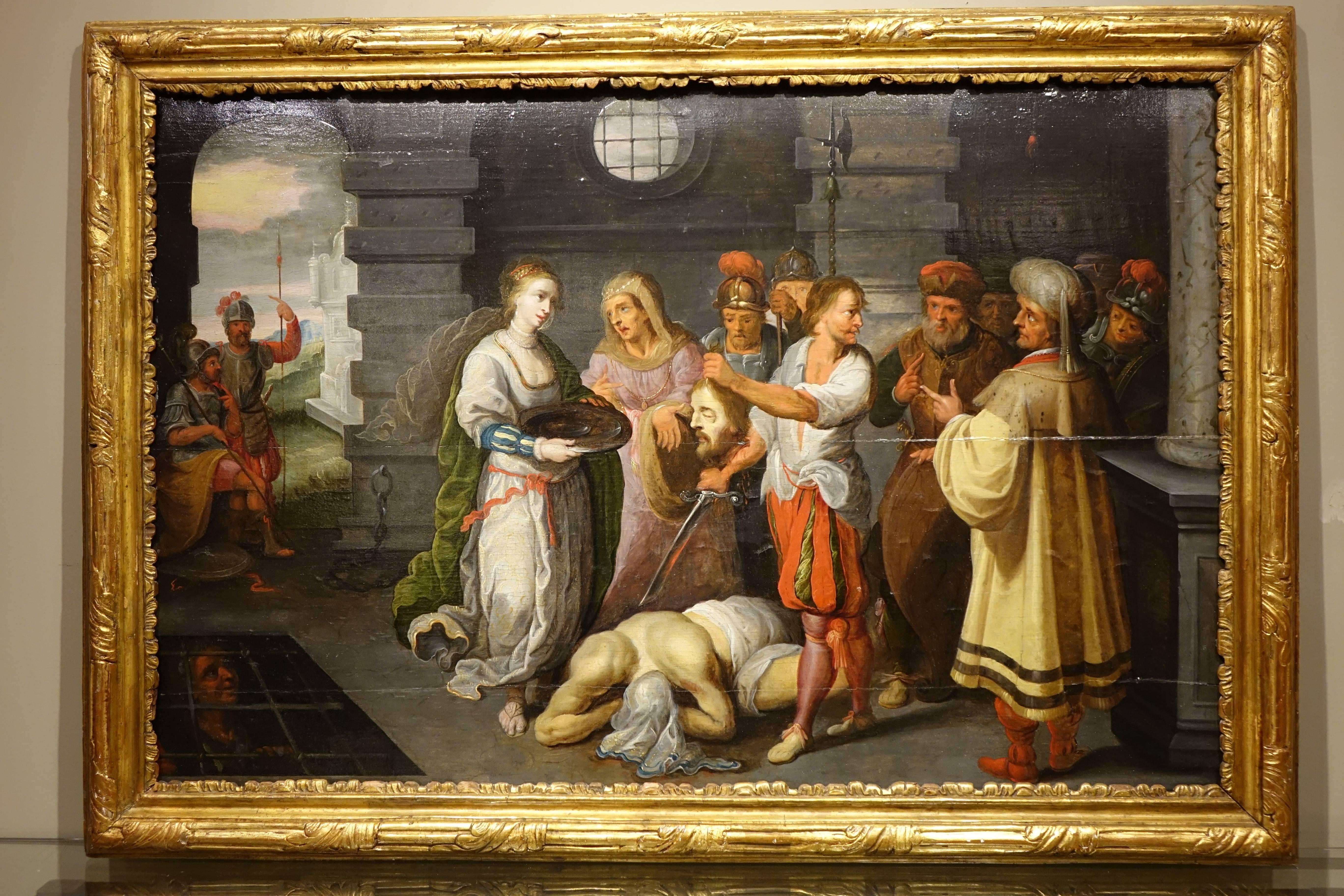 
Salome and King Herod before the tortured body of John the Baptist.
She asks the head of the Baptist after having bewitched the king dancing before him (new testament.)
Oil on oak panel. Bears the mark of Antwerp workshops on the back of the