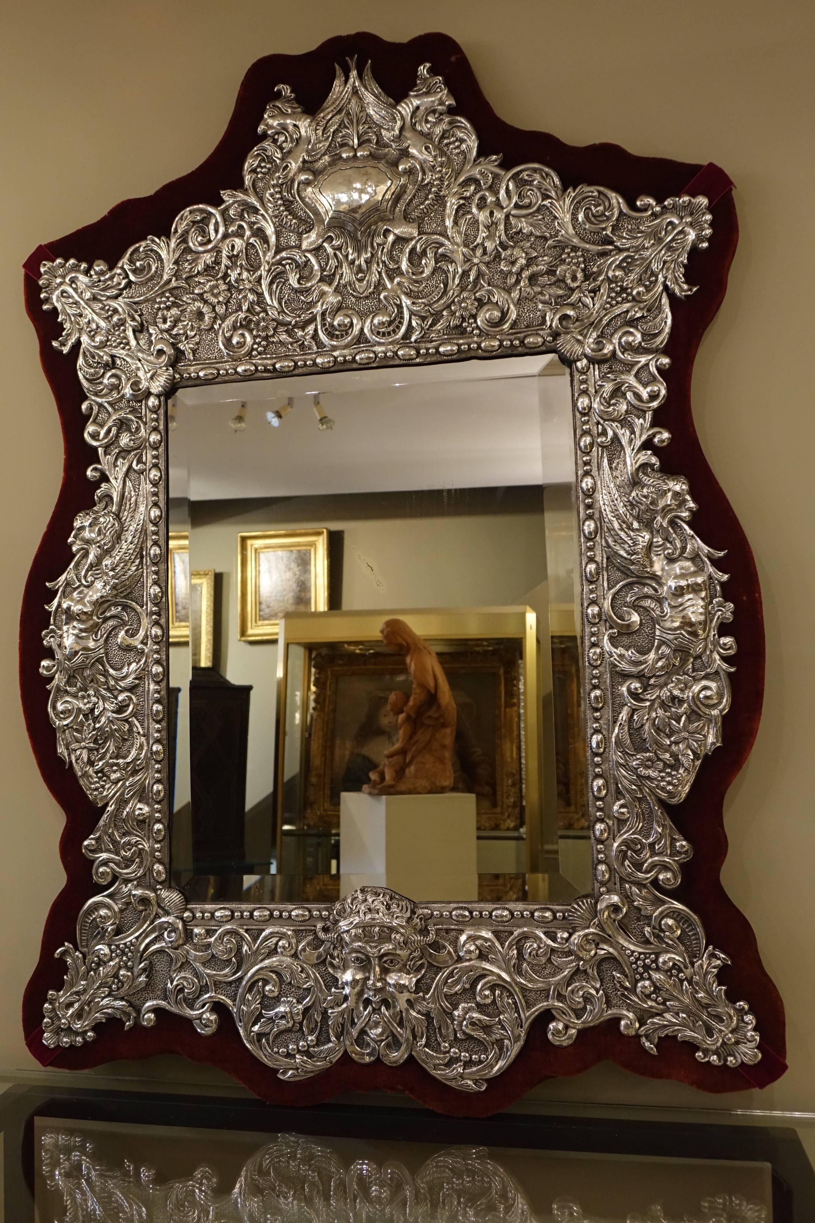 Neo renaissance 19th century silver plated mirror, France
Original mercury glass mirror, Original velvet fabric.