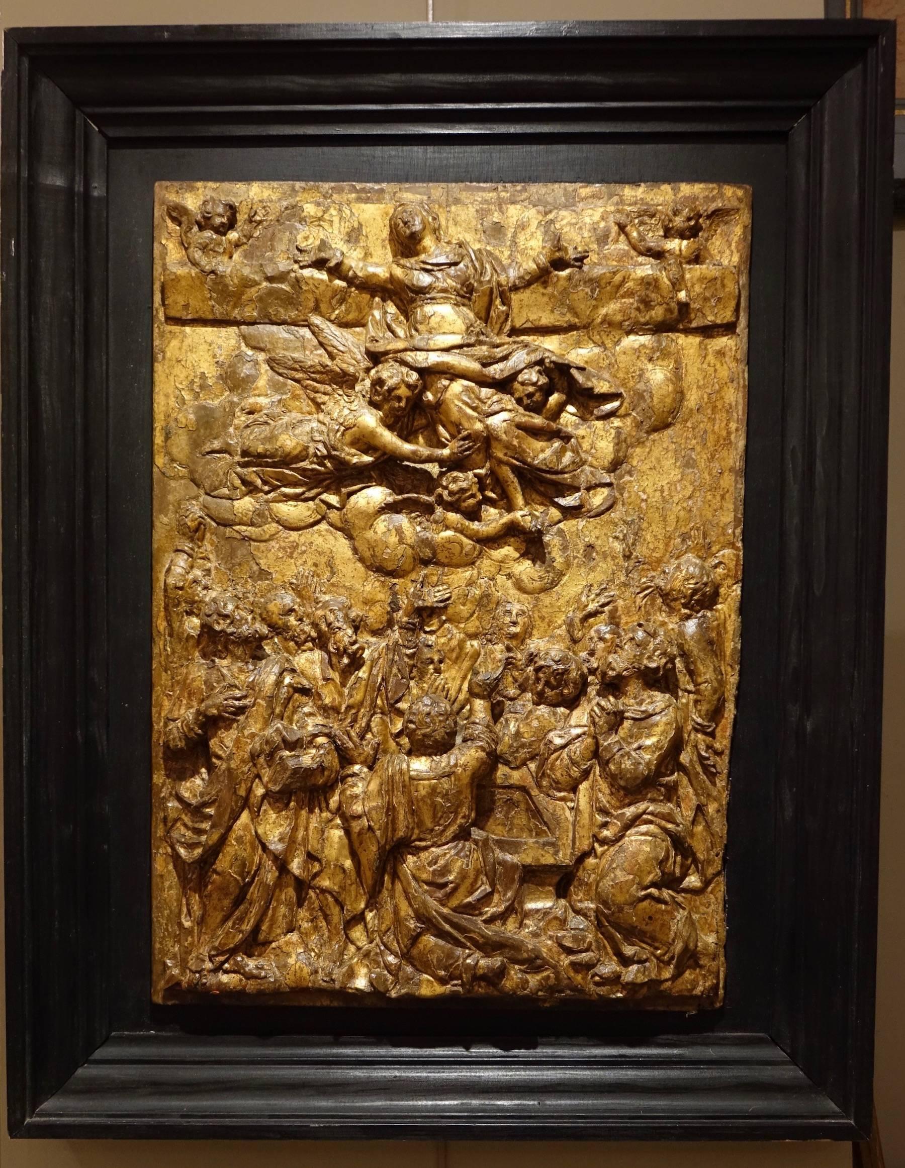 Pair of carved oak , gold leaf gilded panels, Flanders or north of France, late 16th century.
Blackened wood frames later period.
One represents the ascension of Christ (elevation?) with the Virgin and the Apostles. The other is the elevation of