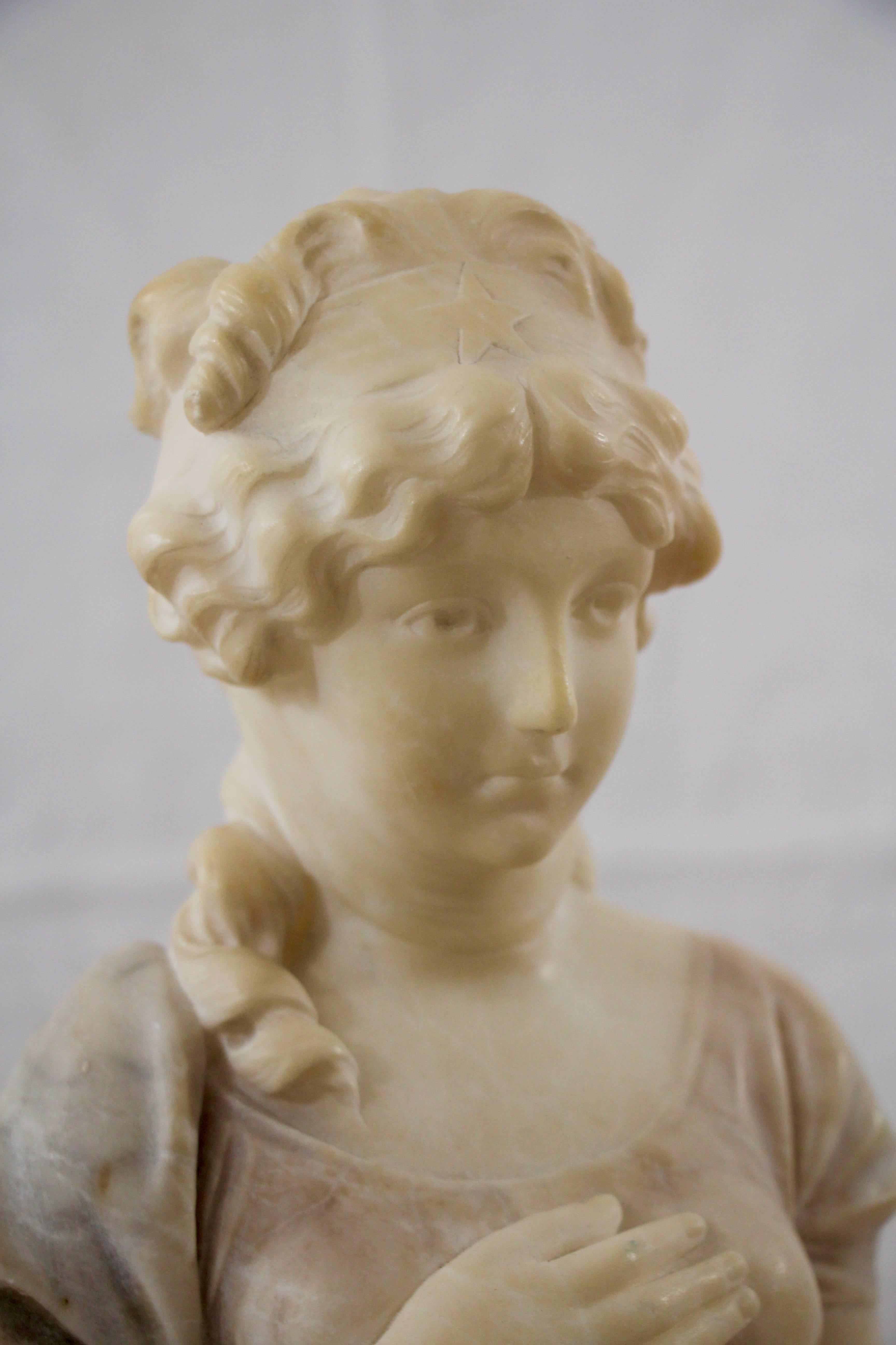 The white and grey alabaster sculpture by Adolfo Cipriani (active 1880-1930) is modeled after a painting of Louise of Prussia by Gustav Richter (1823-84). Signed to reverse, on a green marble base.
