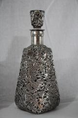 Set of Four Glass Decanters with Silver Overlay