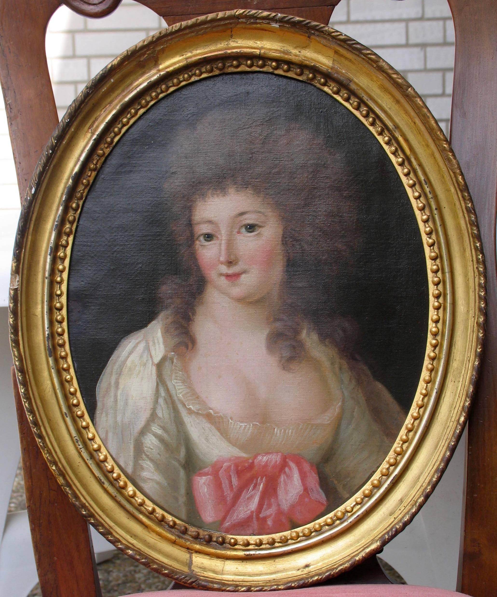 A pair of 18th century portrait paintings of a lady, France. The paintings may have been part of a set of four representing the Four Seasons. The painting showing the lady wearing a fur hat and scarf would be the representation of winter, whereas