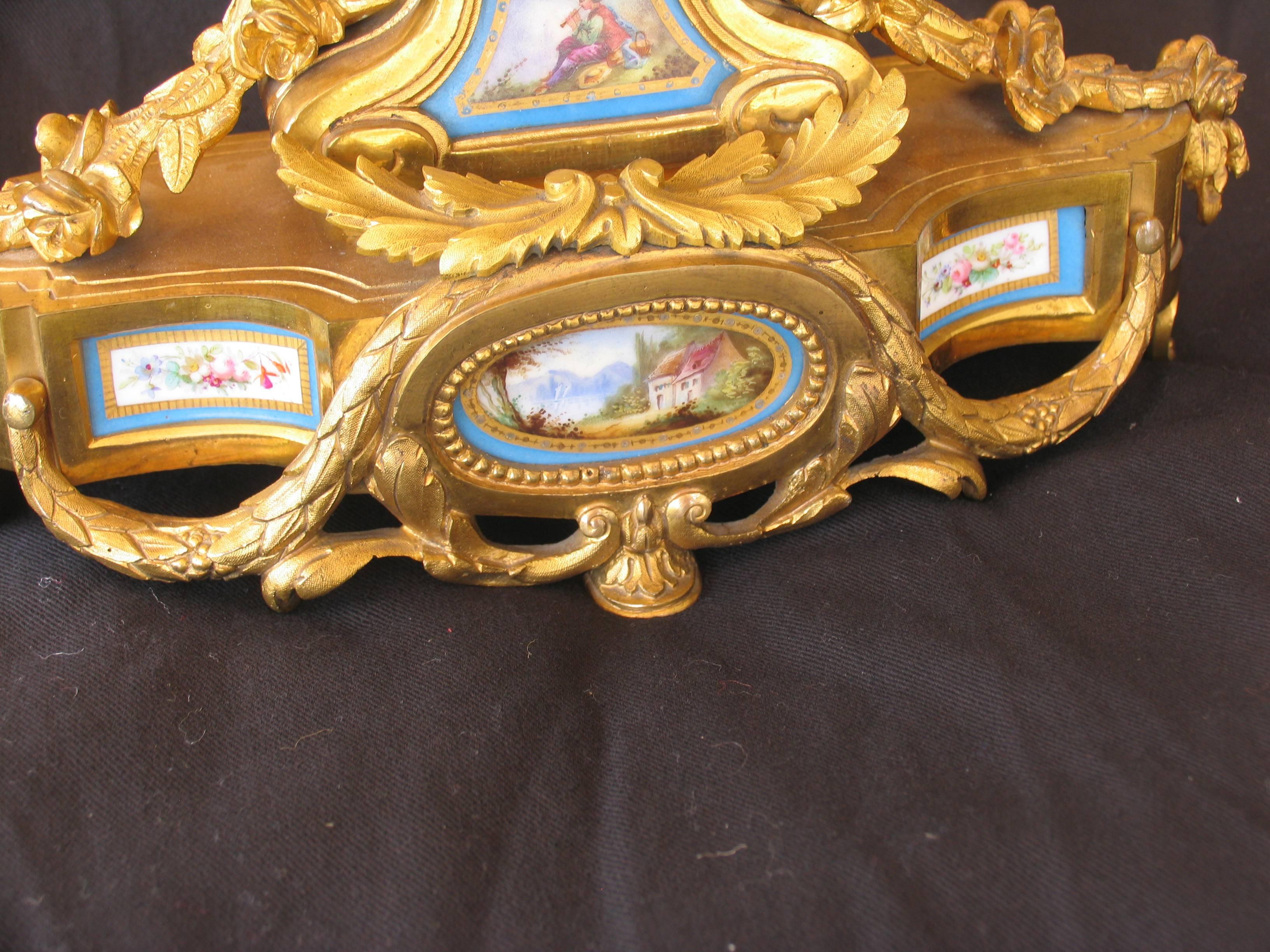 Unique French 19th century mantel clock.
This exquisite mantel clock has a Sevres porcelain dial plate and other Sevres porcelain decorations.  
The movement with spring suspension. Striking every half hour on a bell. 
The shipping from Germany to