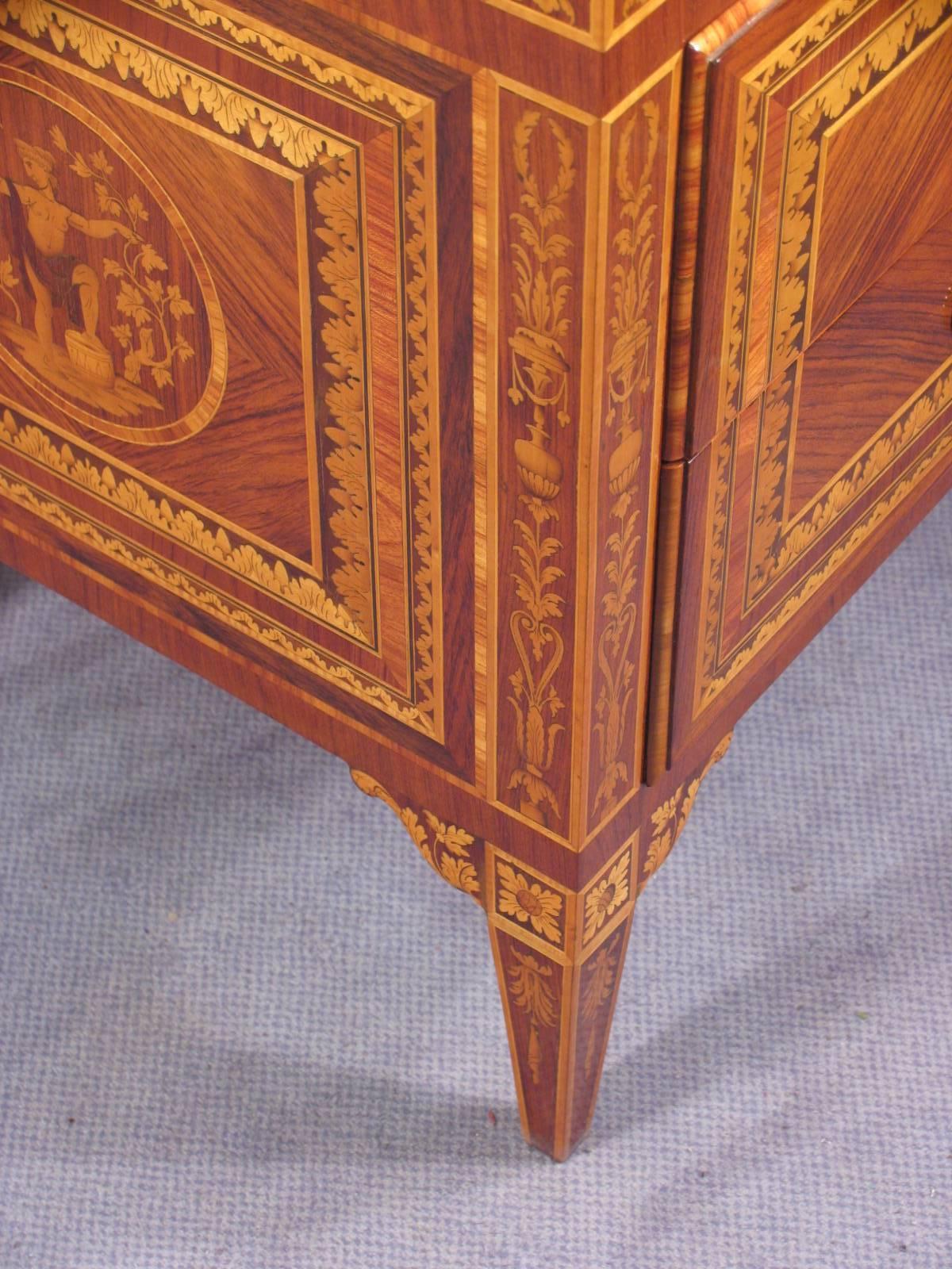 Exceptional commode, Italy, second half of the 19th century, in the style of Giuseppe Maggiolini. Exquisite marquetry in kingwood, rosewood and satinwood. In excellent condition. The commode will be shipped from Germany. Shipping costs to Boston are