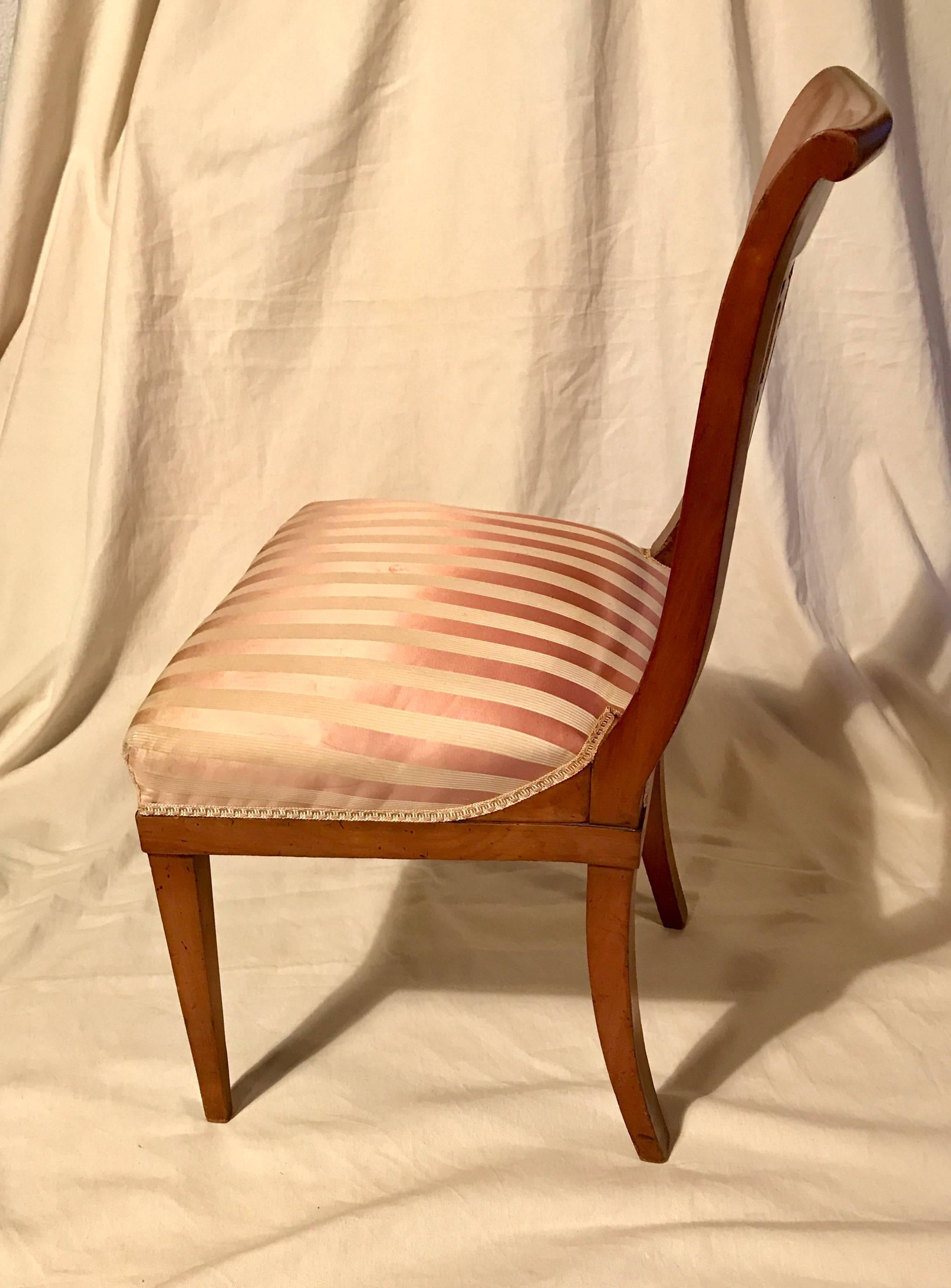 Set of six unique classicist chairs, Germany, 1810, cherrywood. The backs are exquisitely carved. The chairs are in very good original condition. 