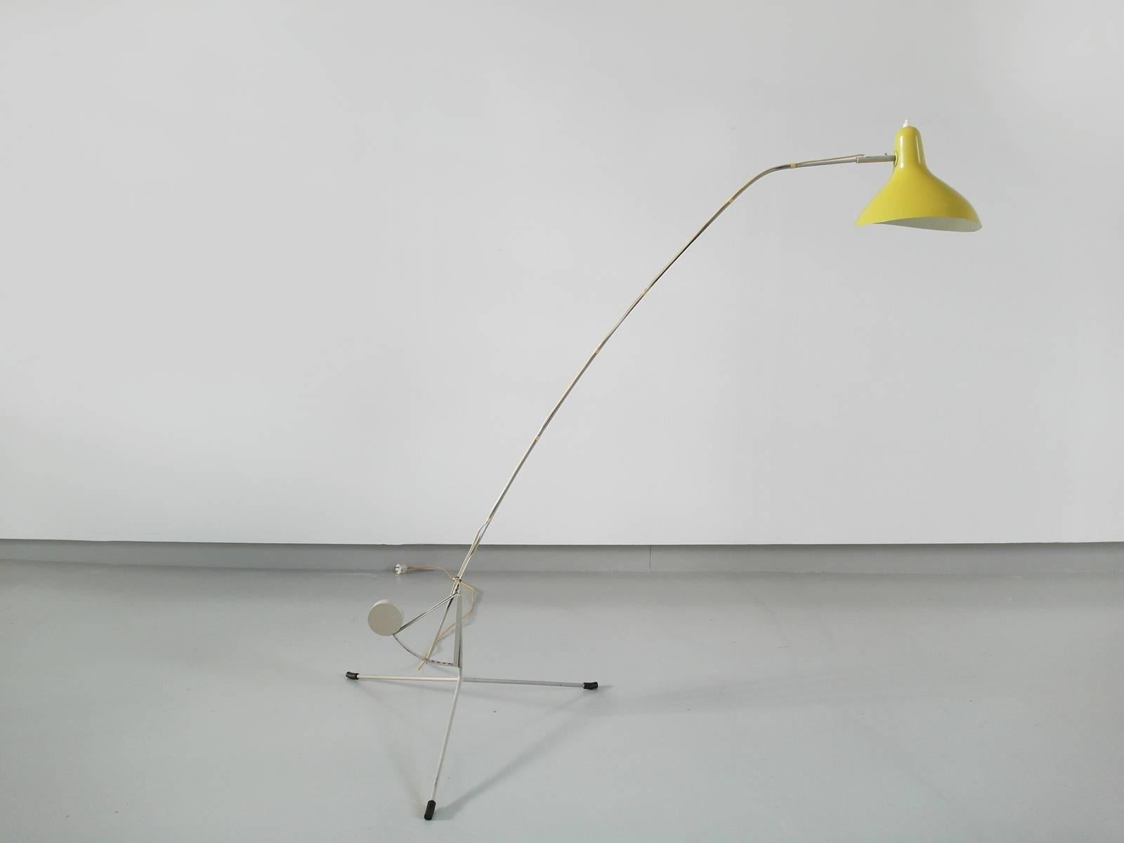 This is an original and rare example of an adjustable floor lamp called Mantis, designed by sculptor Bernard Schottlander (1924 -1999) in 1951. 
This lamp, produced some years later under license of Swedish Bergbom was only produced between 1953