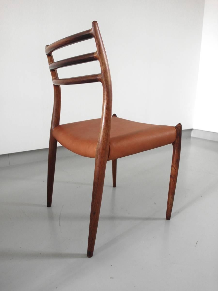 Danish Niels Otto Møller Set of Four Rosewood Model 78 Dining Chairs Cognac Leather