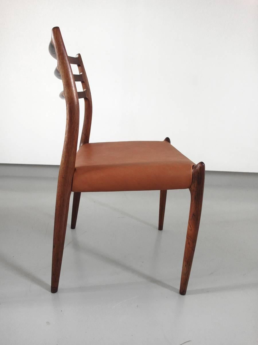 Mid-Century Modern Niels Otto Møller Set of Four Rosewood Model 78 Dining Chairs Cognac Leather