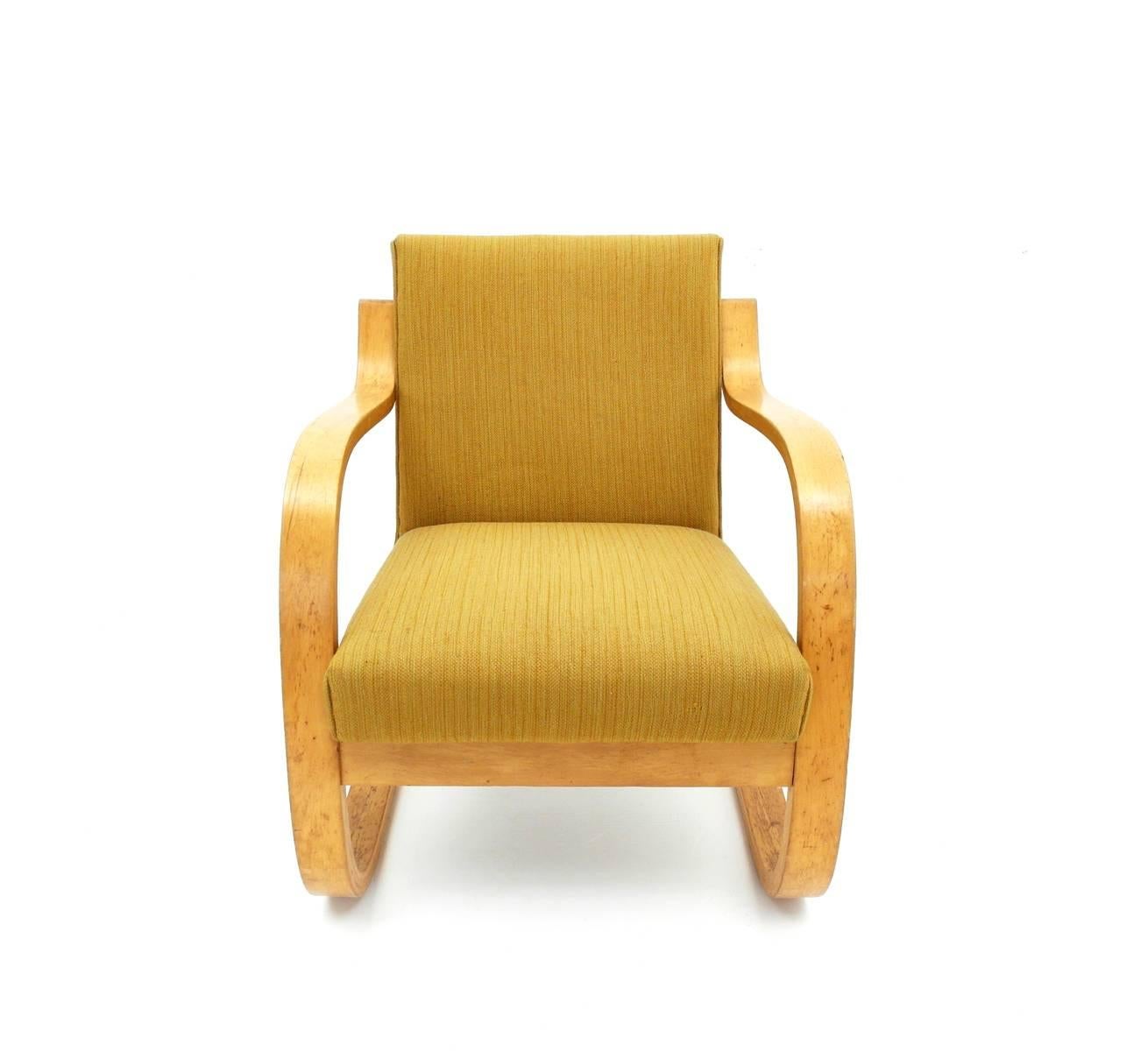 Armchair model 402 designed by Alvar Aalto in 1933. Manufactured by Artek. The chair is marked with a stamp "AALTO DESIGN Made in Finland".
This stamp refers to a rare pre-war Finnish Artek production between 1935 and 1940. Original