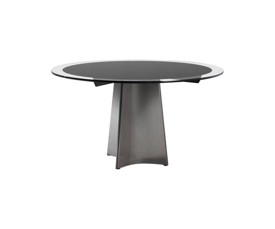 Brushed aluminium round dining table designed by Luigi Saccardo for Maison Jansen - Arrmet, France, Italy, 1970s. The table features a thick glass top, a thin layer of black vinyl is applied to underside of the tabletop. The sculptural base consists