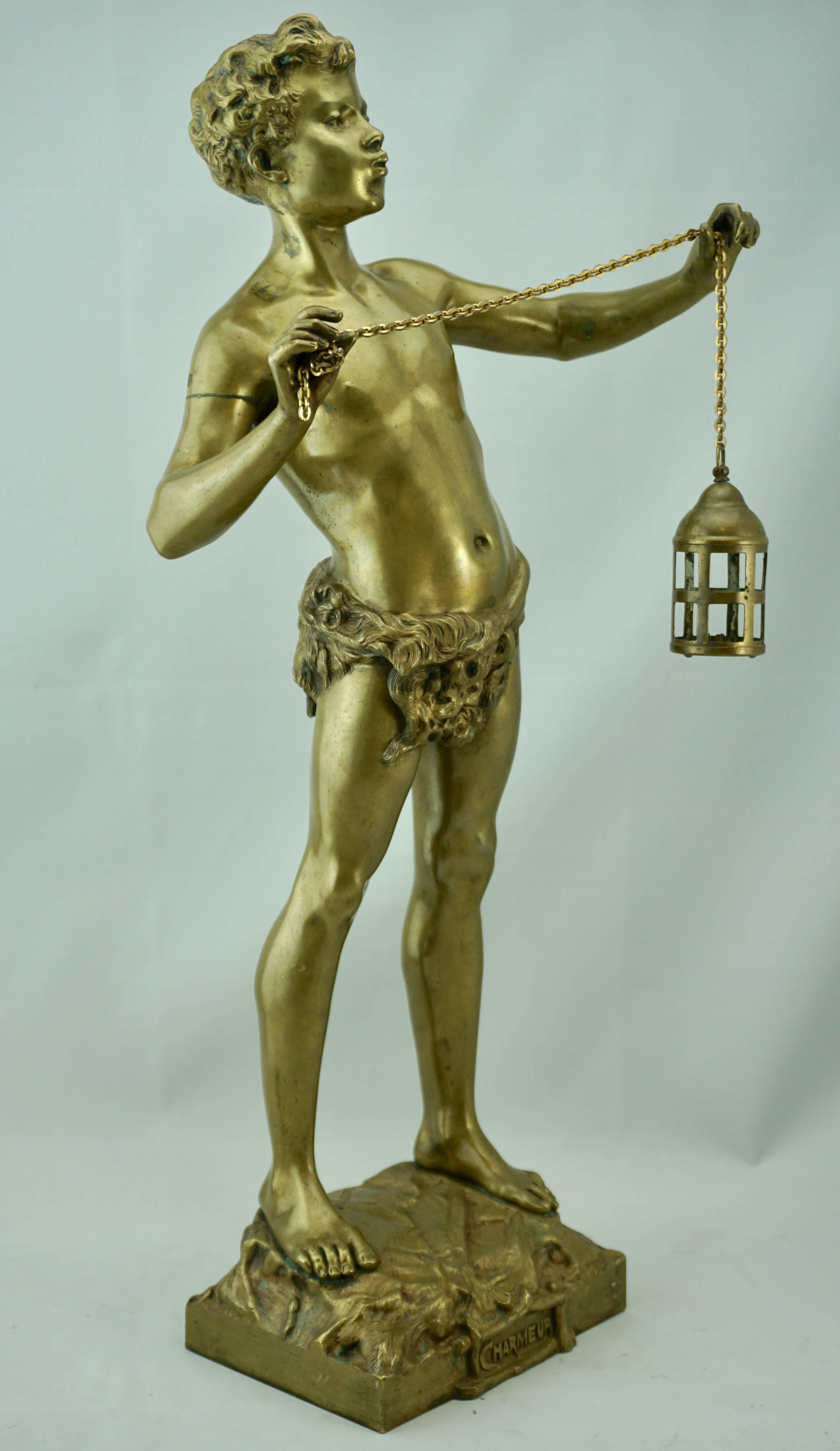 Adolphe Jean Lavergne (French, 1852-1901)
Adolphe Jean Lavergne gilt bronze figure of semi nude boy with lantern. Charmeur (Charmer)

Marks: Lavergne, CHARMEUR

Measures: Height 20.25 inches.
   