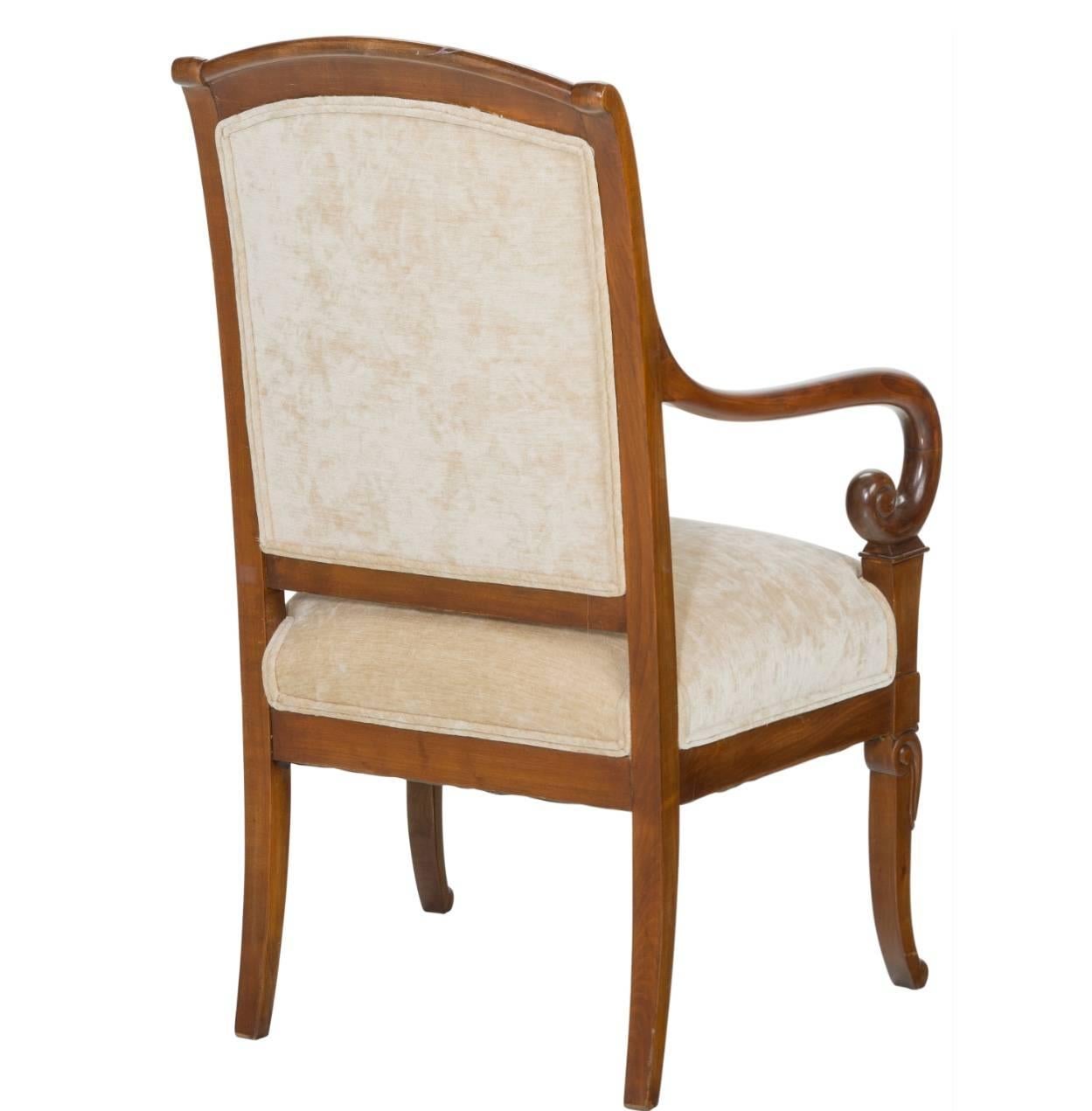 19th century French Charles X mahogany armchair, circa 1825. The perfect armchair coming right after the Louis XV, Louis XVI periods in Franch with elegance and charm. Contemporary upholstery with no appearance stains or issues.

Height: 36.75