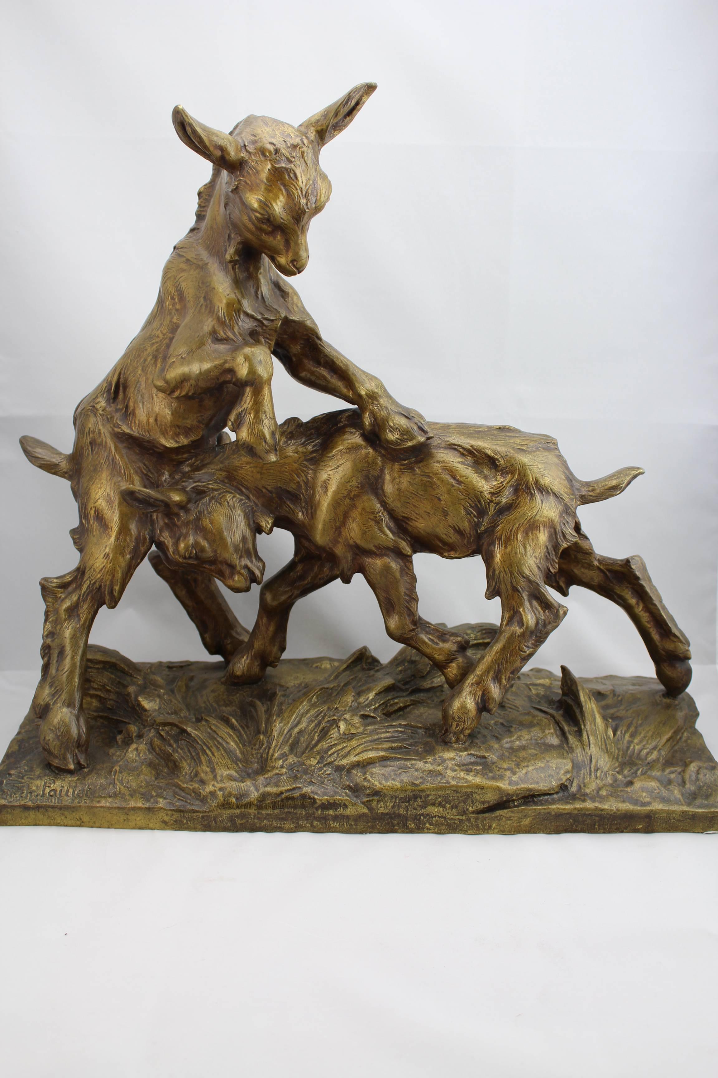 A large Charles Paillet French (1871-1937) bronze of two playful goats 