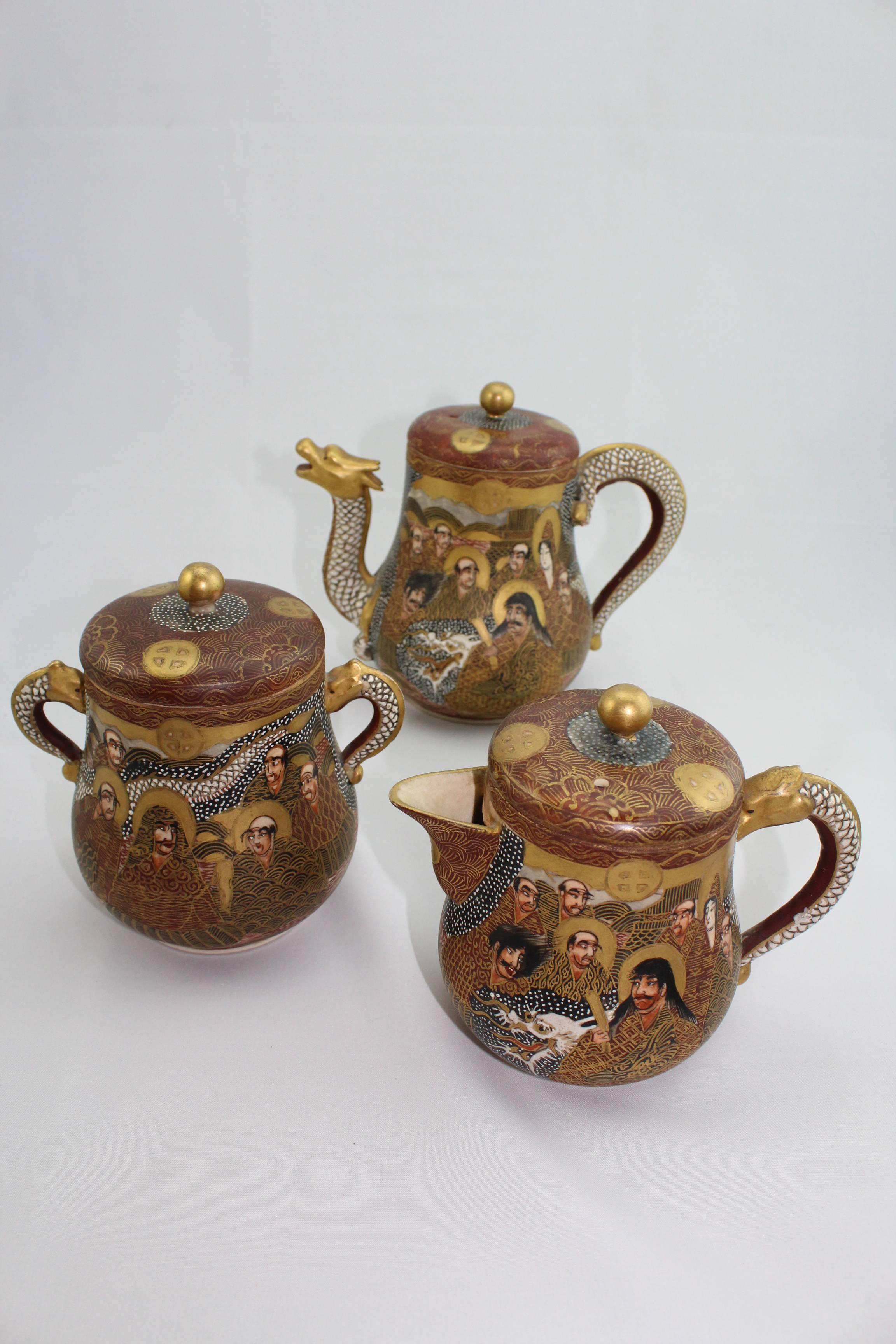 From the Richard (Dick) Bass estate.

Finely painted Japanese Satsuma porcelain dragon and immortals tea set from the Meiji period (1868-1912). The set consists of a teapot, sugar pot, milk pot, three lids, six cups and six saucers. 18