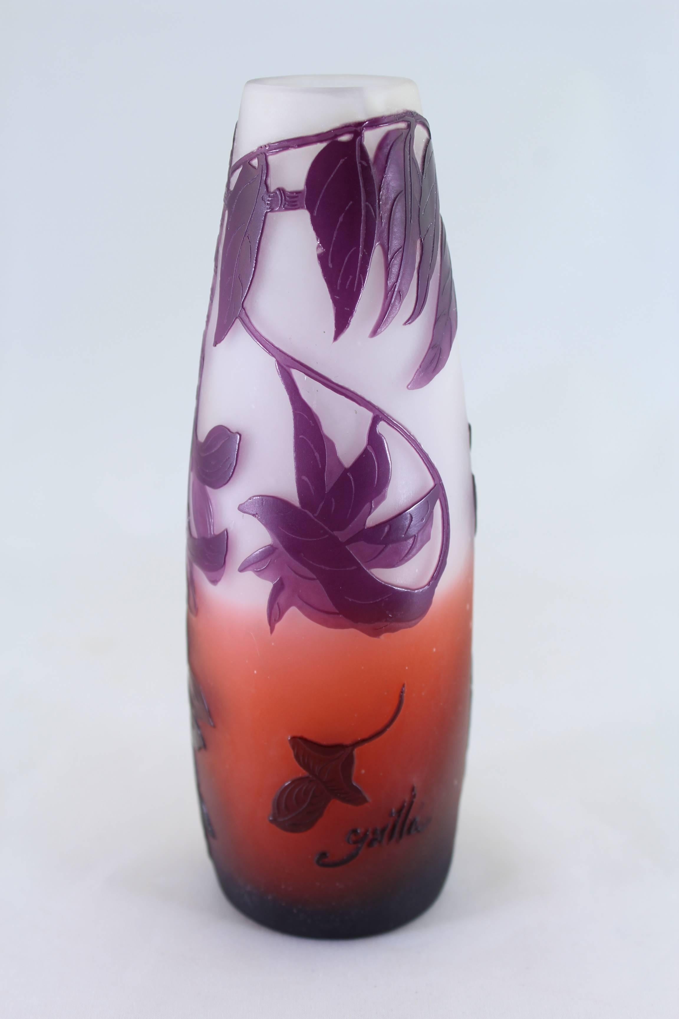 Emile Galle three color cabinet vase consisting of cream, umber orange and purple with cameo acid etched leaves, vines and flower buds.
Signed in cameo: Galle.
Height: 6.4 inches.

Please view my other Art Glass pieces by Galle, DAUM Nancy,
