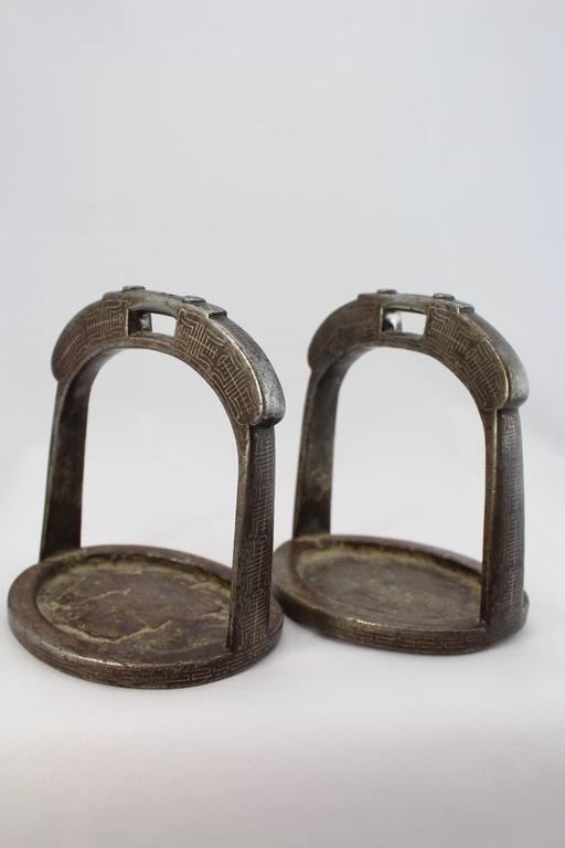 From the Richard (Dick) bass personal collection acquired by him on one of his three expeditions (1982, 1983, 1985) through Katmandu to climb Mt Everest to be the first man to climb the seven summits.

Pair of Tibetan or Chinese 19th century iron