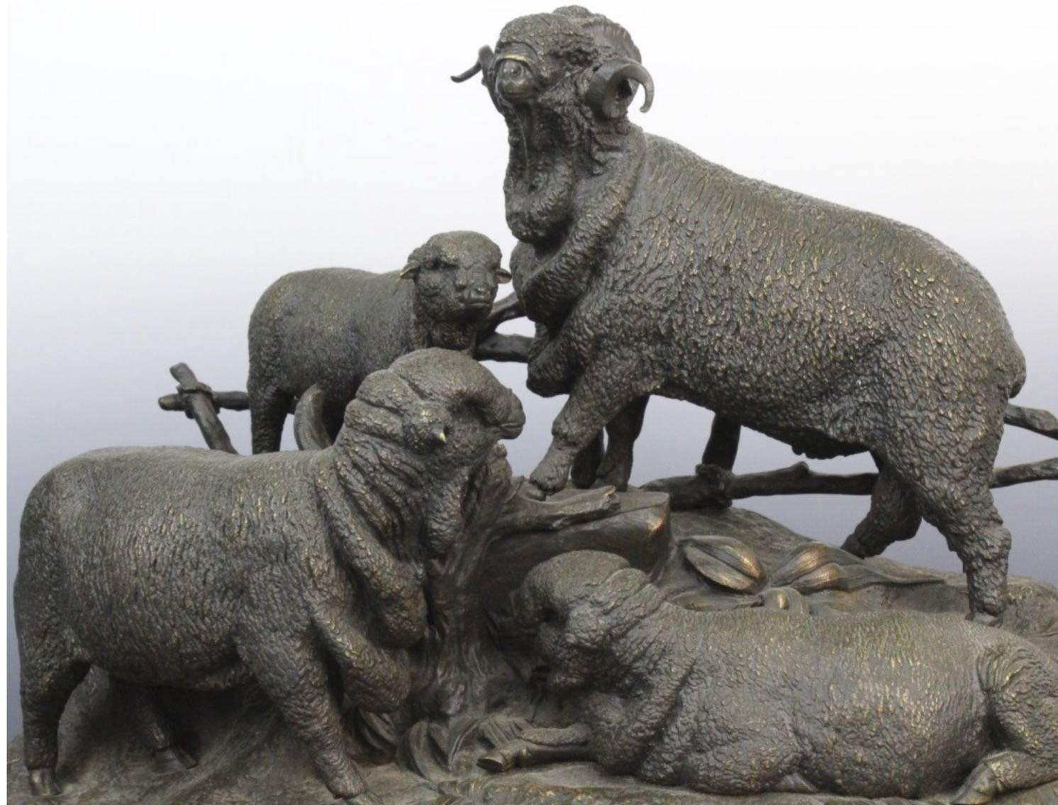 Antique figural grouping of a Ram or Sheep family by Jules Moigniez. Cast bronze construction with very nice detailing and dark patina. Signed on the front. Measures 16