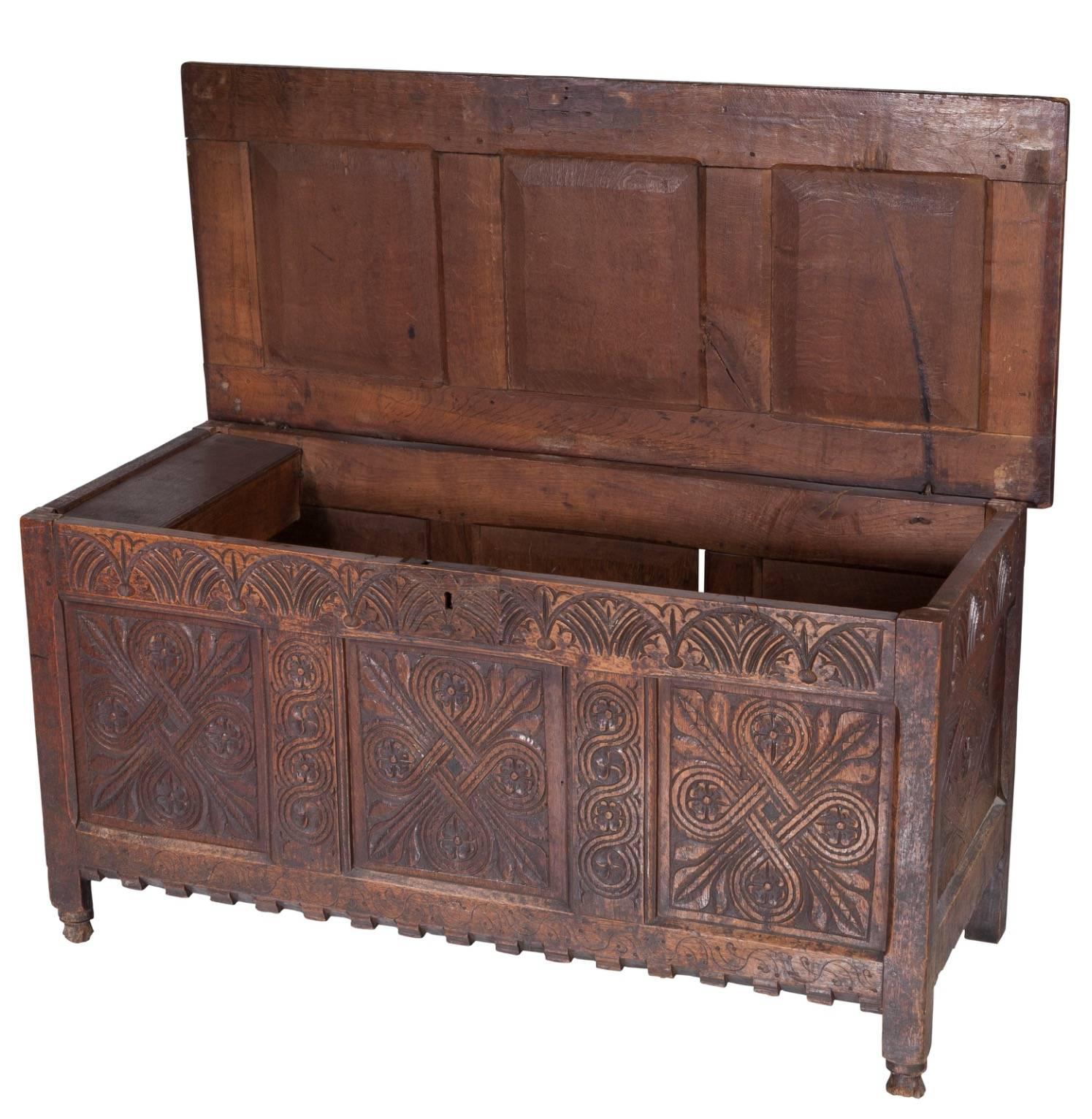A Jacobean carved oak blanket chest, 17th century and later. Iron hinges.
Measures: 25 inches high x 49 inches wide x 21-1/4 inches deep (63.5 x 124.5 x 54.0 cm).

Property from the estate of Richard D. Bass, Dallas, Texas. 

Condition