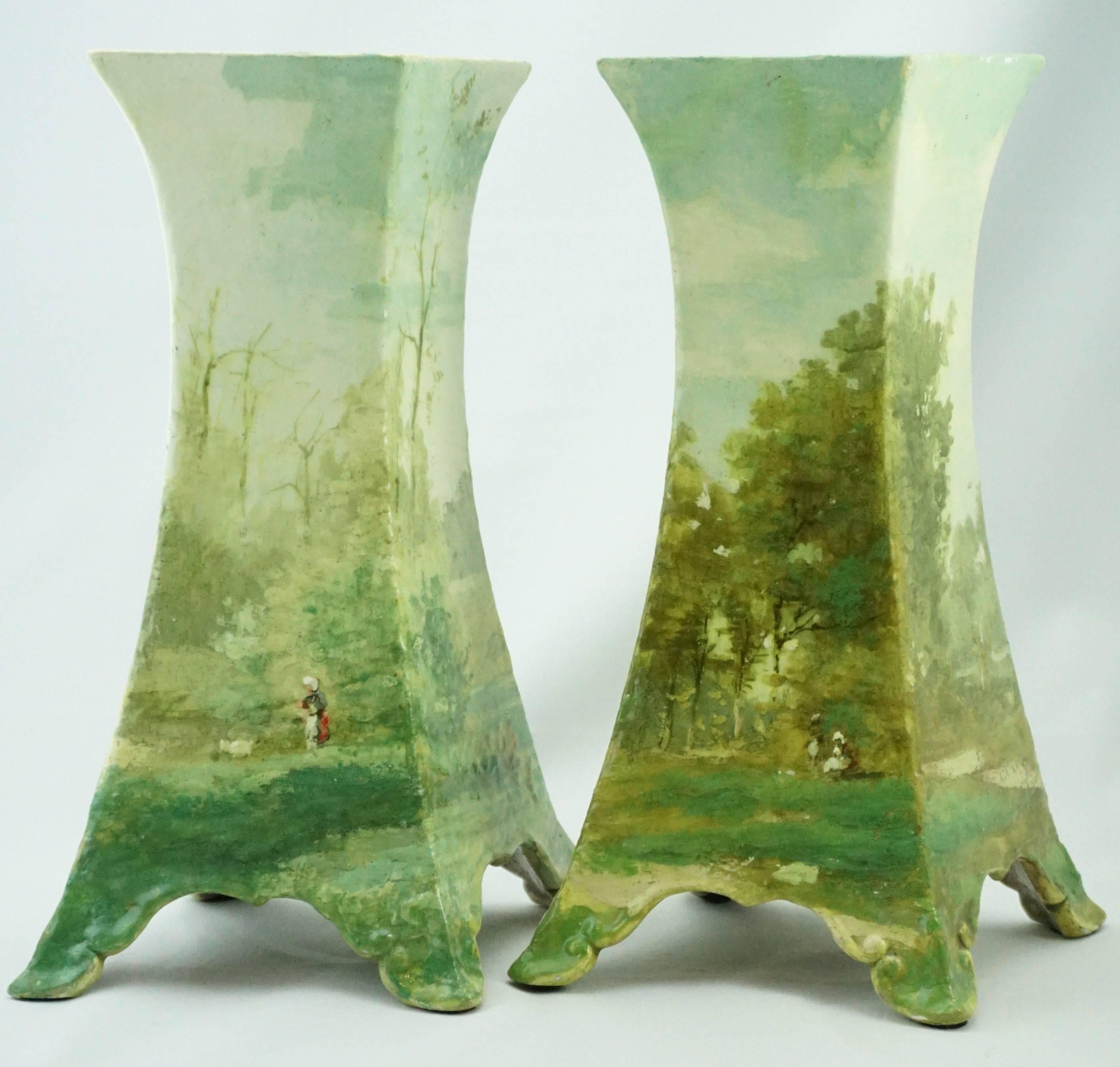 French 19th century Majolica hand-painted enameled impressionist Barbizon landscape paintings with figures in the woods. Absolutely stunningly painted vases. Perfect for your fireplace or display cabinet.

Impressed E.G (Possibly Emile