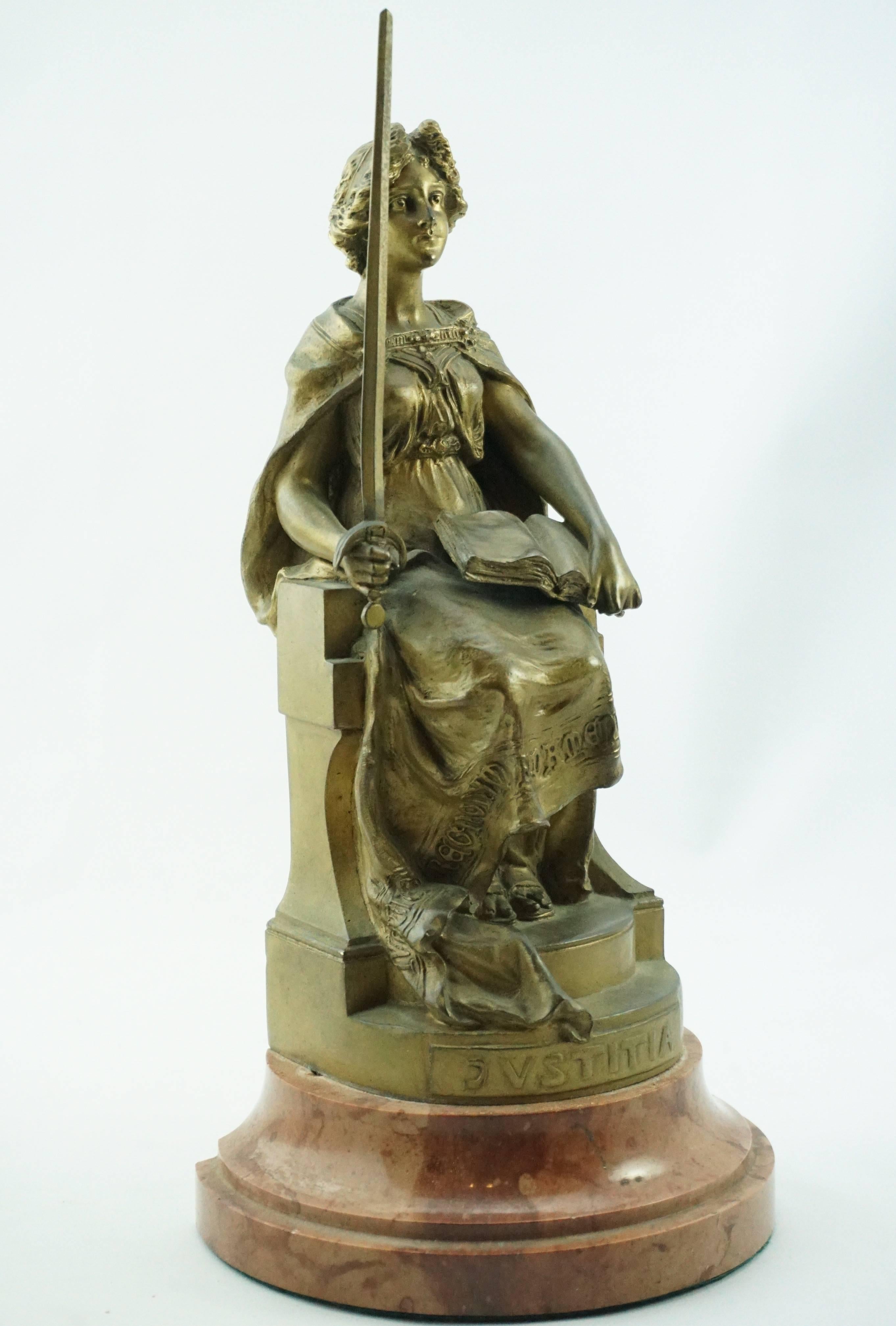 Wonderful and rare original Carl Kauba (1865-1922) gilt bronze of a Lady with sword and law book titled 