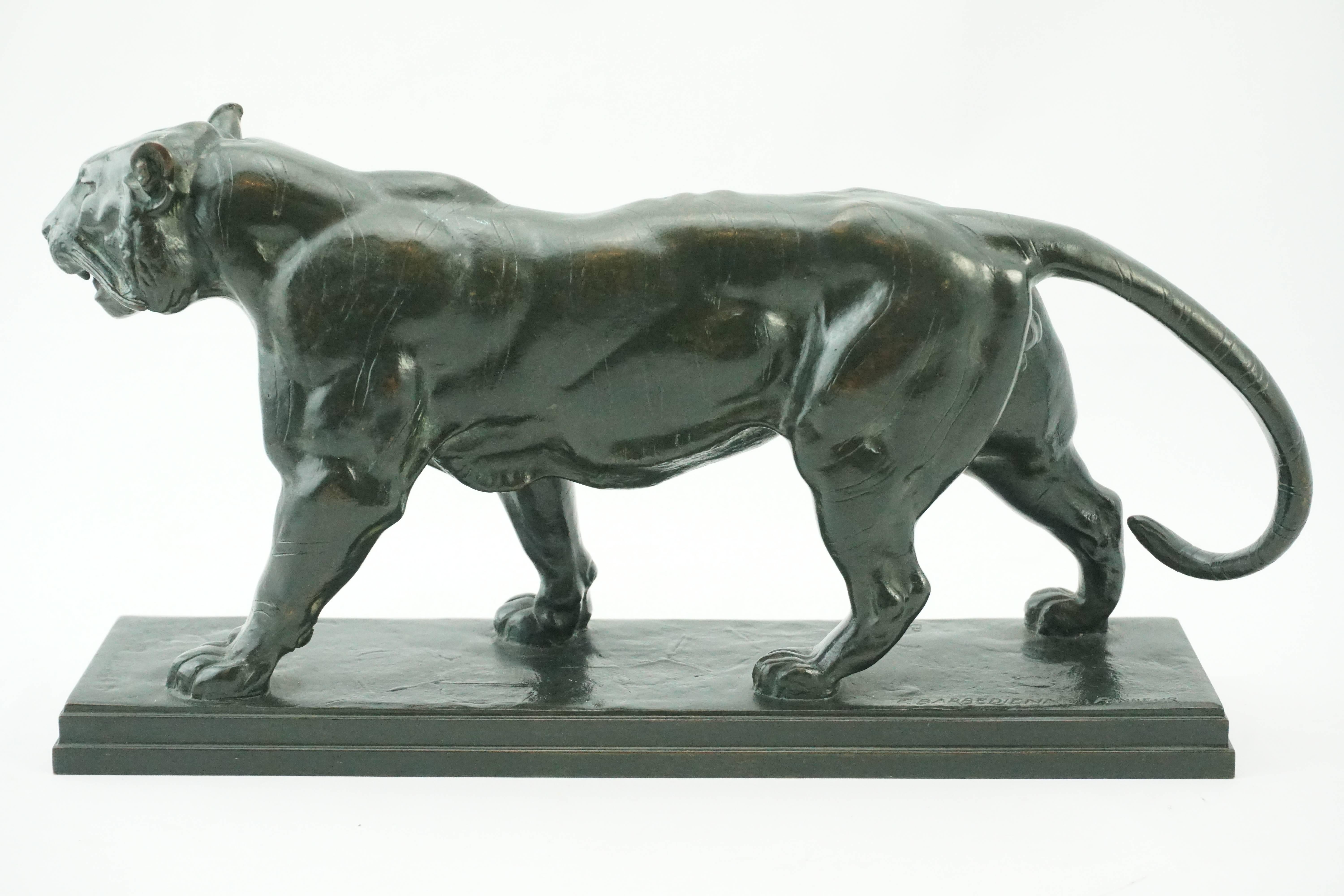 Antoine Louis Barye (French 1795-1875) Animalier. Striding Tiger. 'Tigre qui marche'
After a model by Antoine-Louis Barye, second half 19th century
A tiger shown stalking, the rectangular plinth inscribed Barye and F. Barbedienne Fondeur. Rich