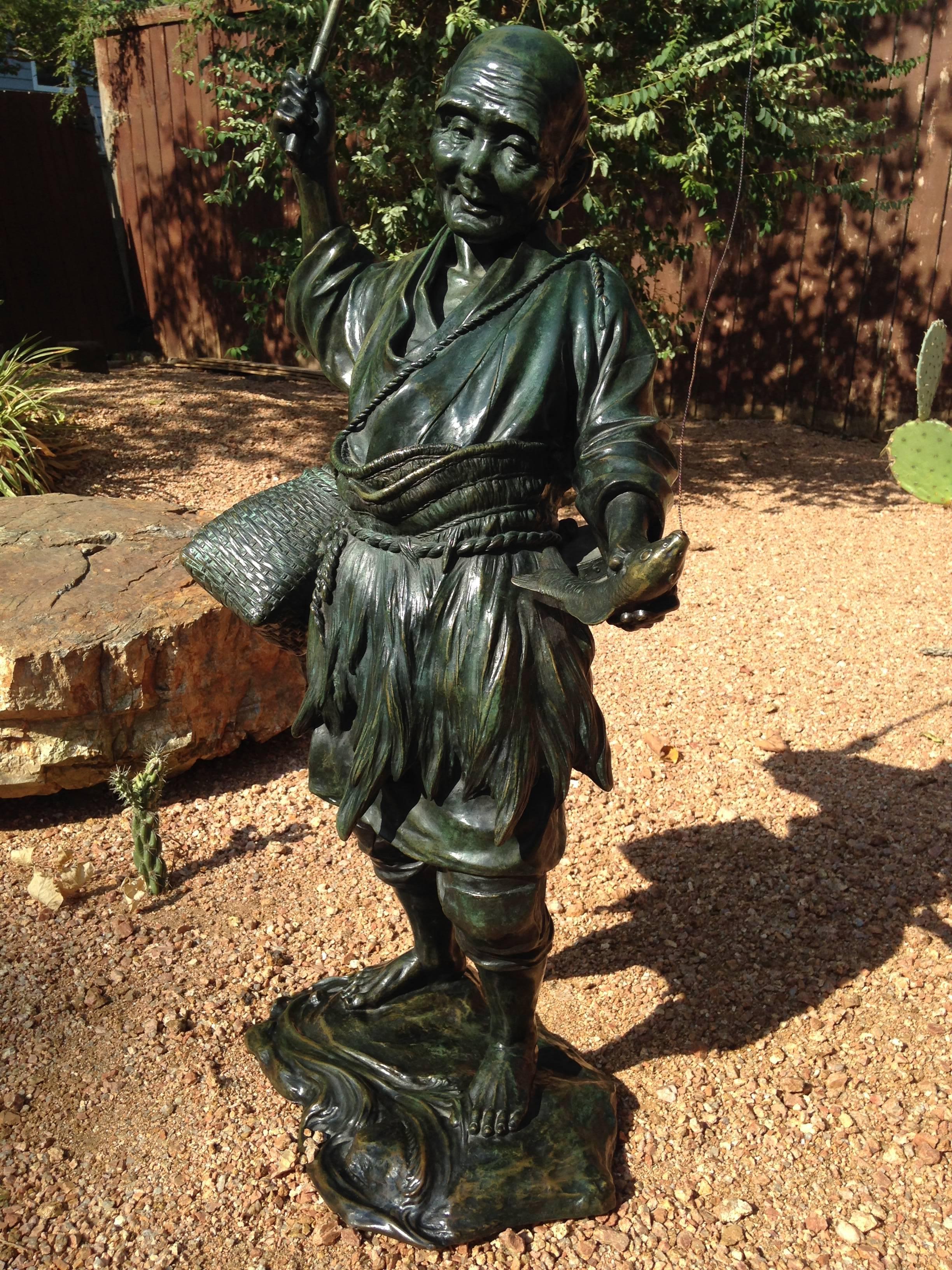 bronze fisherman statue