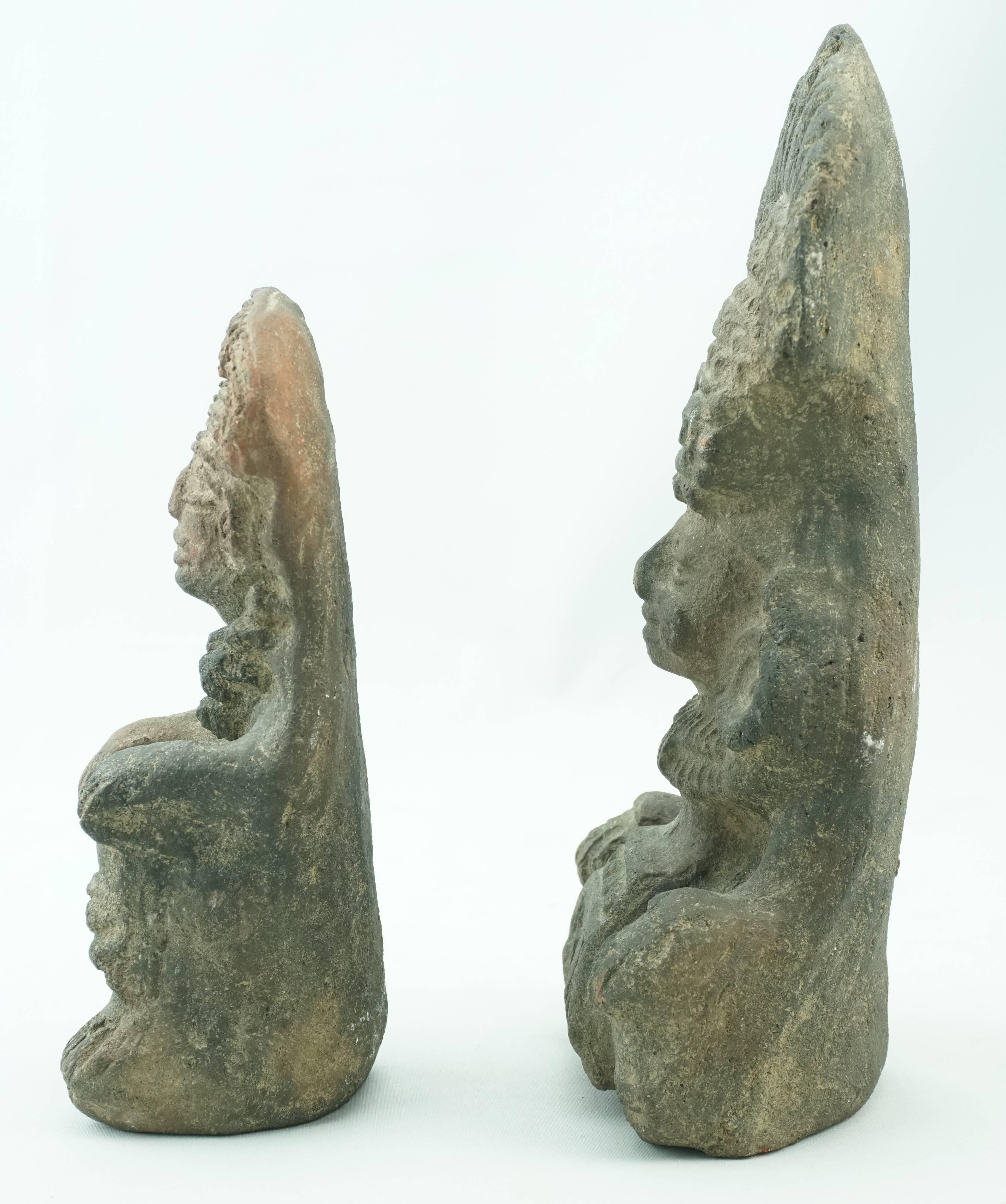 Two pre Colombian carved volcanic stone figures with headdress, circa 1100 AD-1450 AD. Made of Basalt volcanic rock and hand-carved depicting Gods or Royalty in ceremonial head dresses.

Dimensions: Largest: 8 inches tall, 3.9 inches wide, 2.5