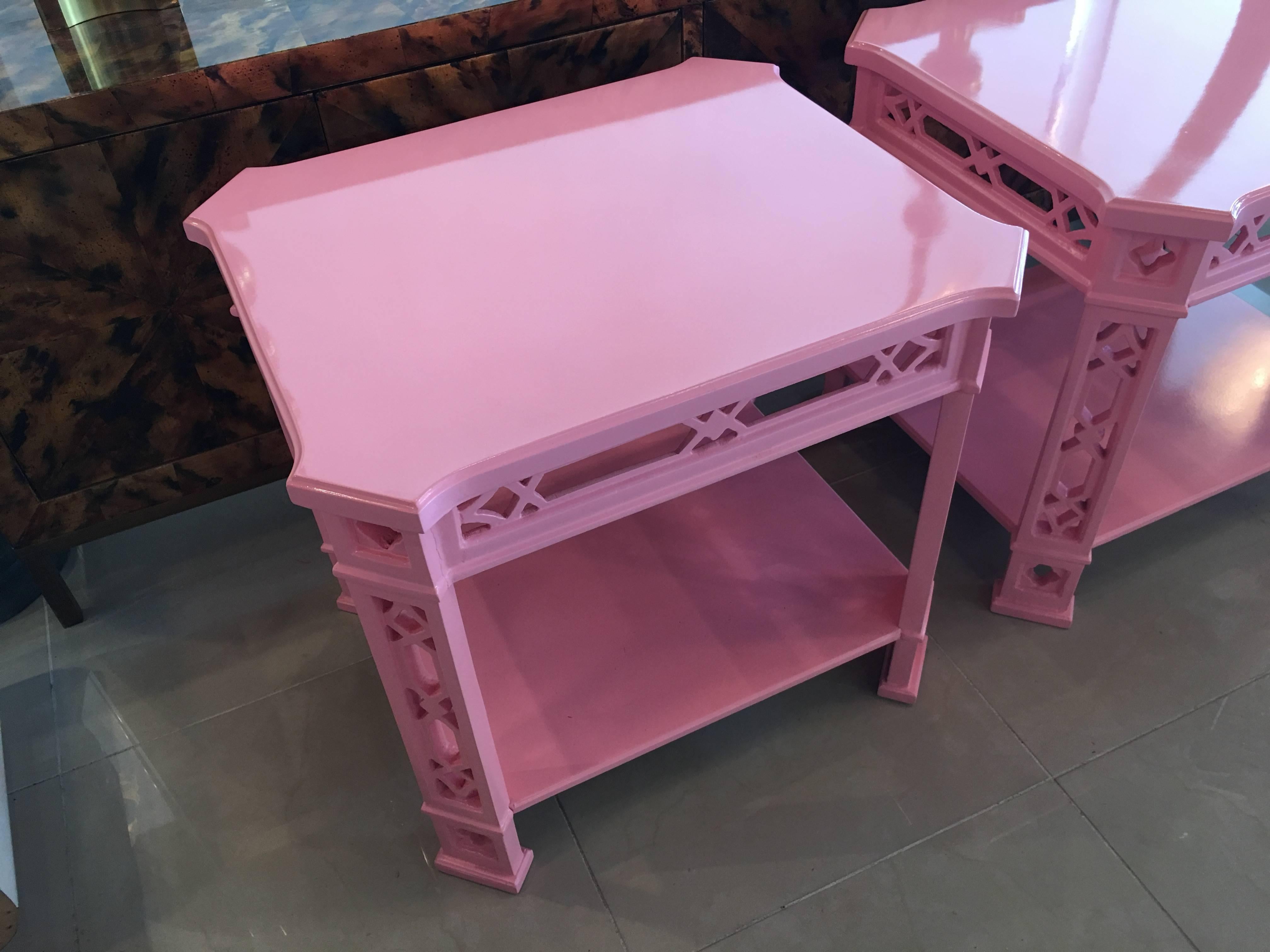 Amazing pair of vintage Hollywood Regency fretwork fret work, Chinese Chippendale, Chinoiserie side end tables, newly lacquered in a coral pink color. May be minor imperfections to the newly lacquered vintage furniture piece.
 