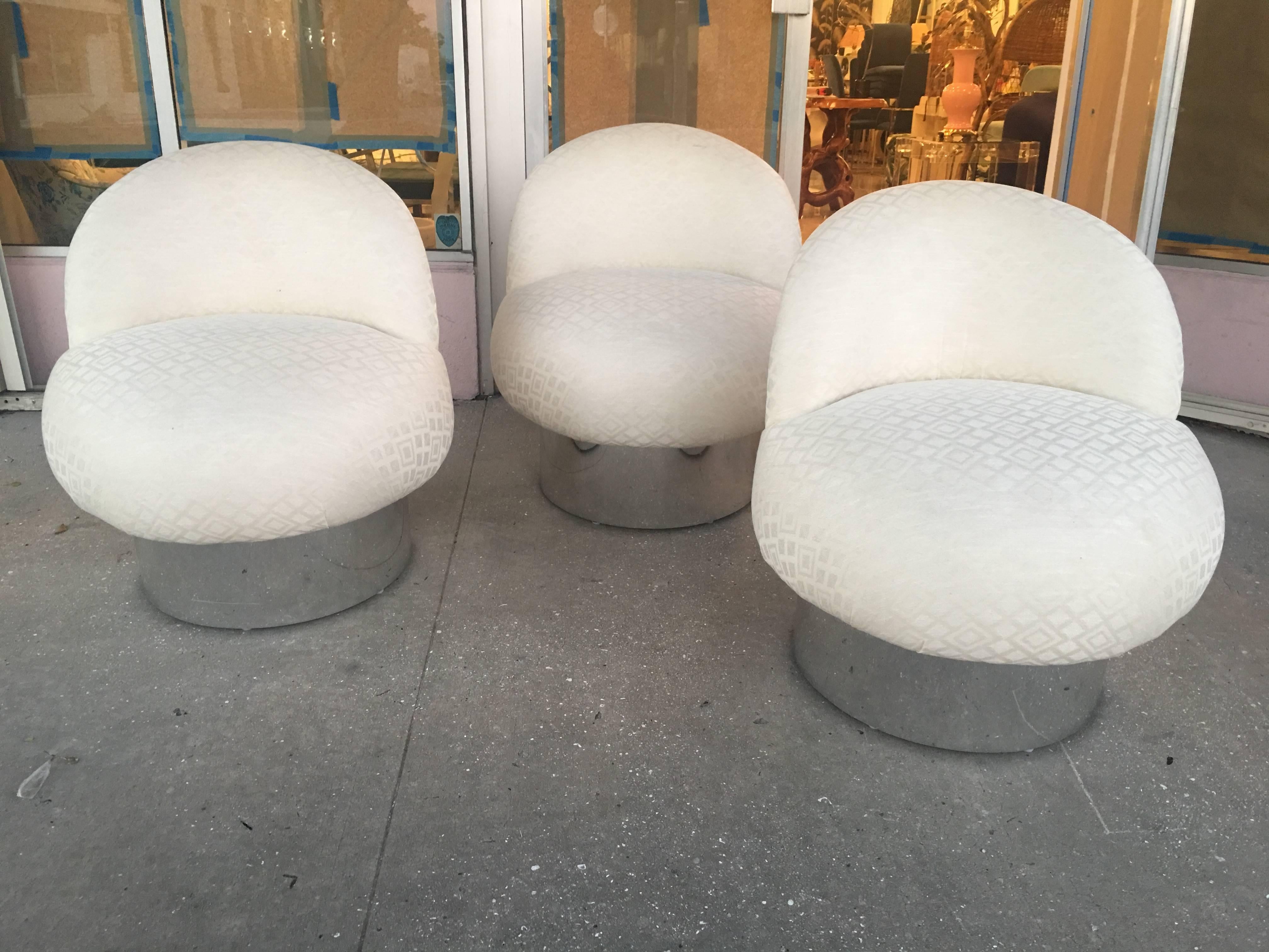 Chrome base swivel tub barrel chairs in the style of Leon Rosen Pace. Sold individually, three available. Original upholstery which will need recovering.
